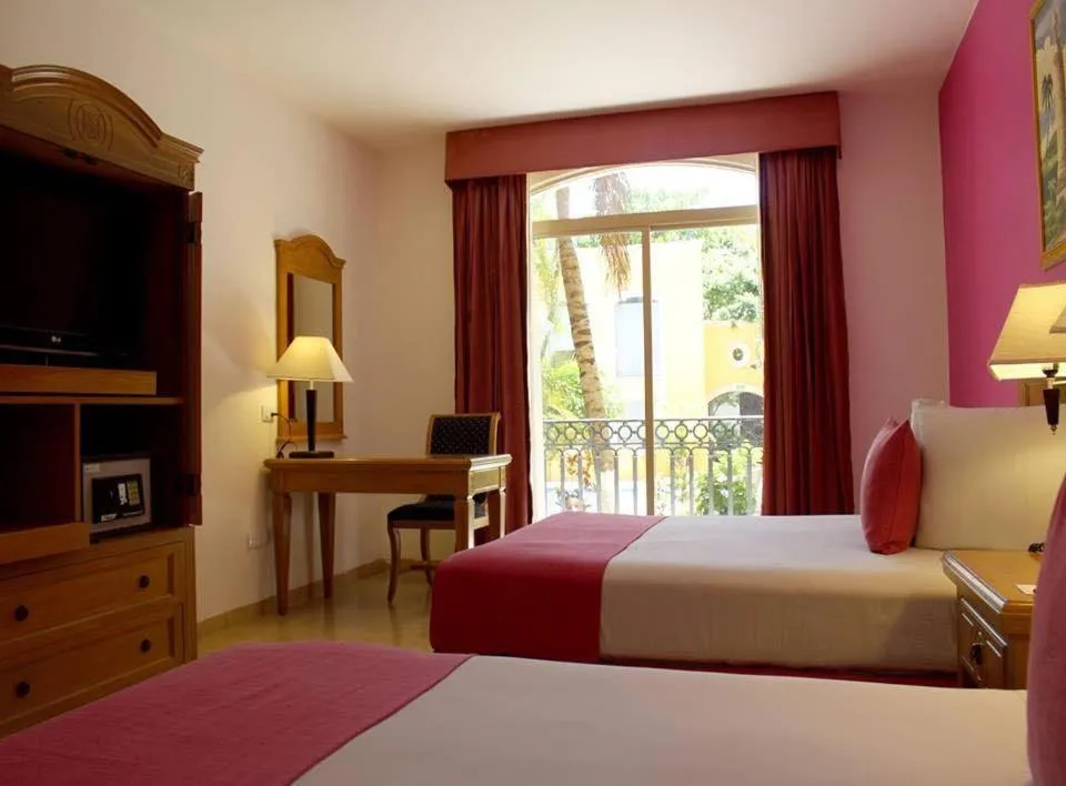 Bed in Hotel Hacienda Real