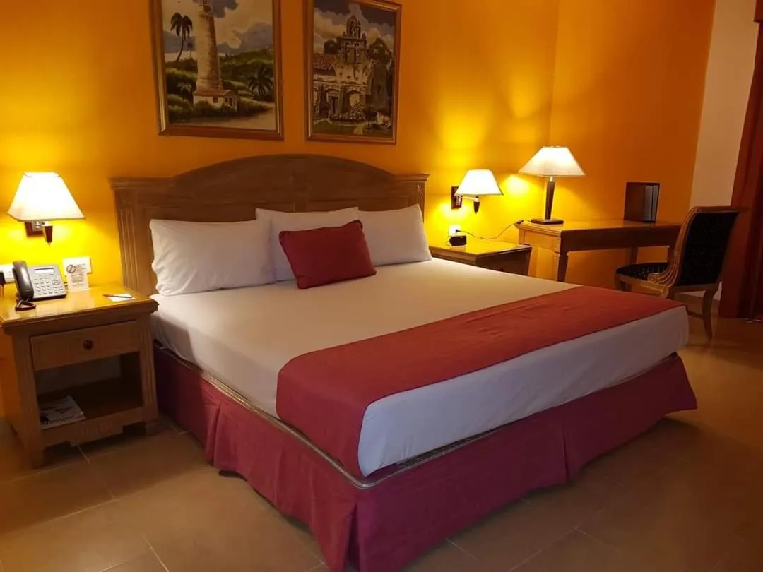 Bed in Hotel Hacienda Real