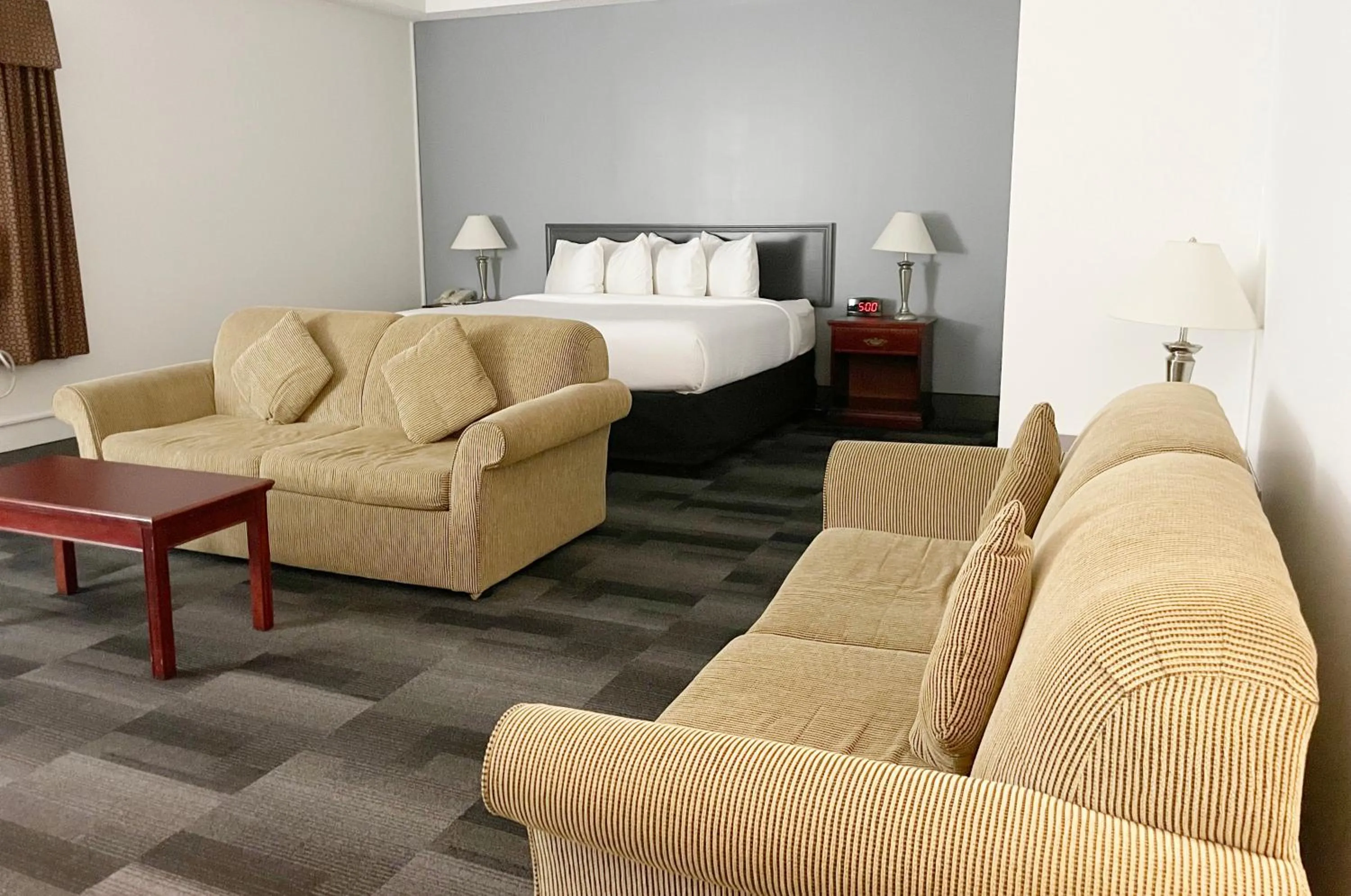 Seating area in Days Inn & Conference Centre by Wyndham Camrose Norsemen