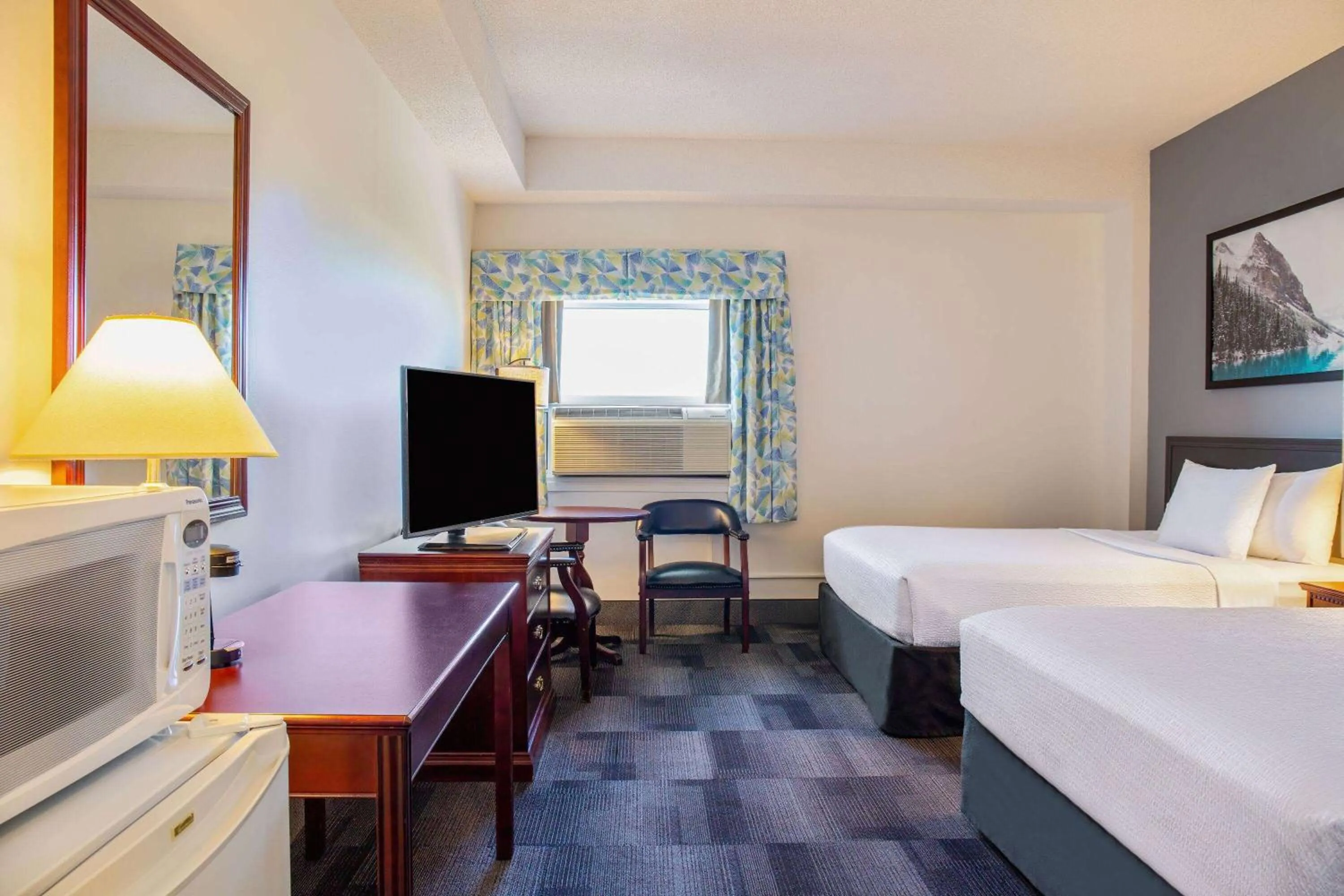 Bed in Days Inn & Conference Centre by Wyndham Camrose Norsemen