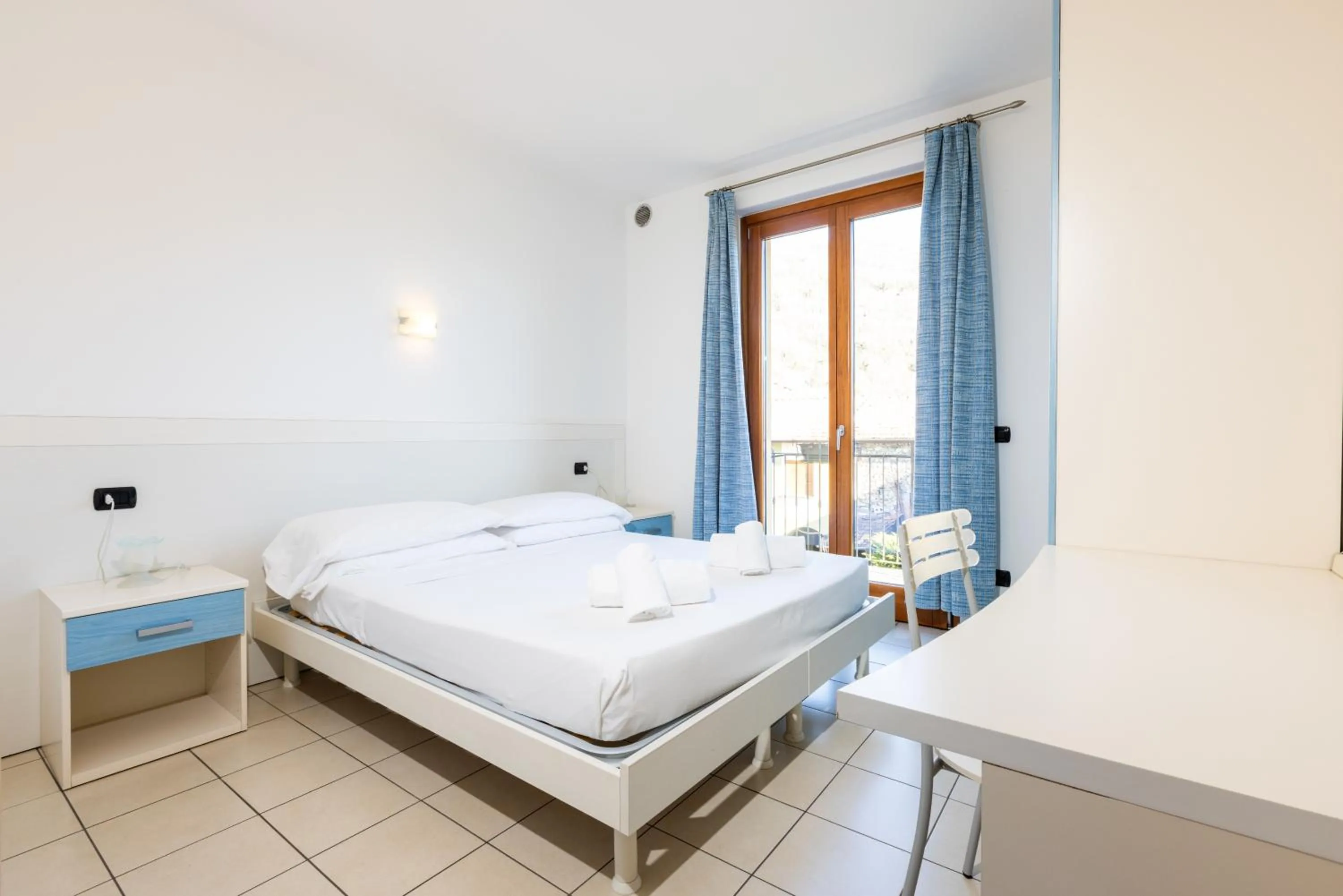 Bed in Spluga "Relax & Apartaments" by Alfio Colombo