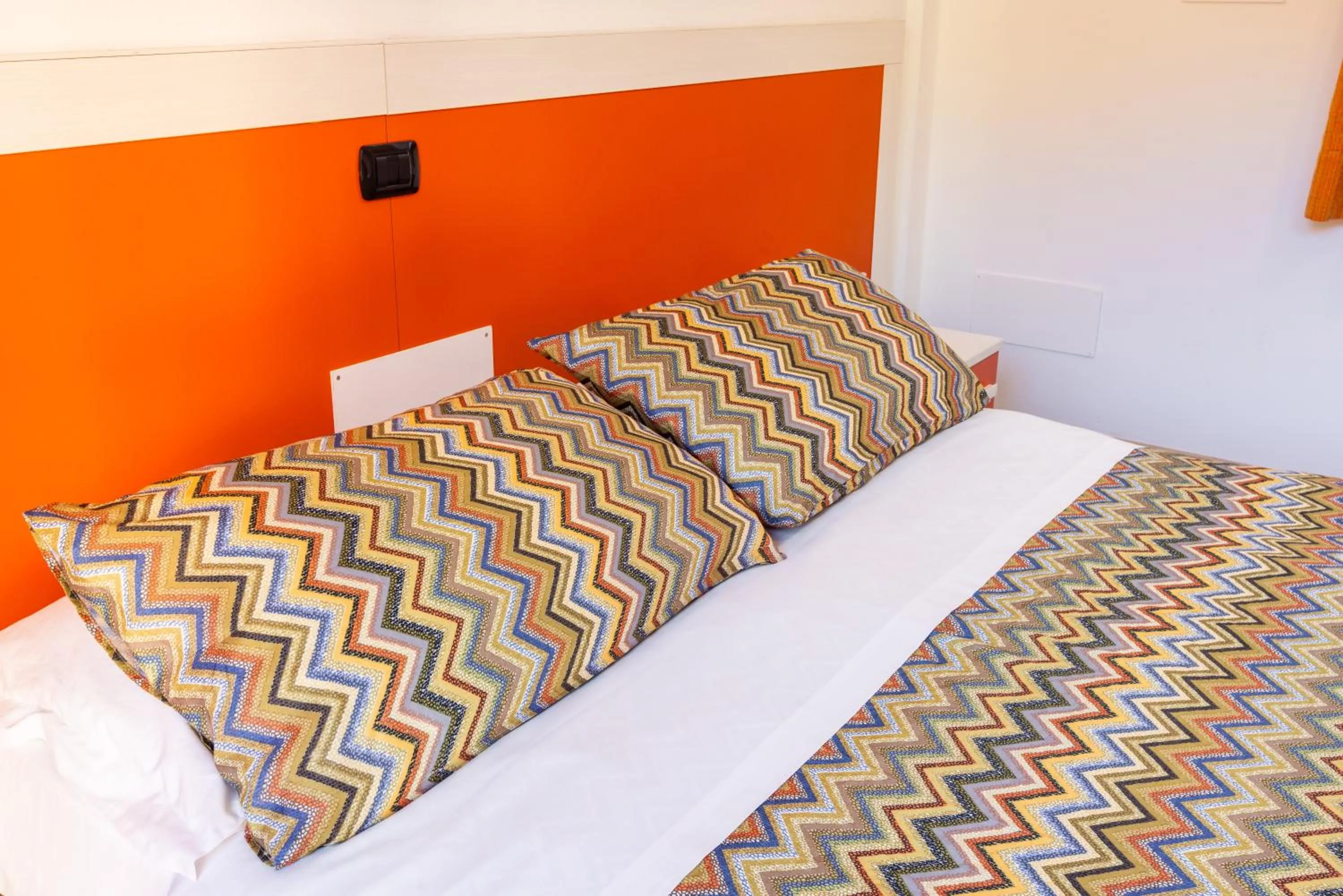 Bed in Spluga "Relax & Apartaments" by Alfio Colombo