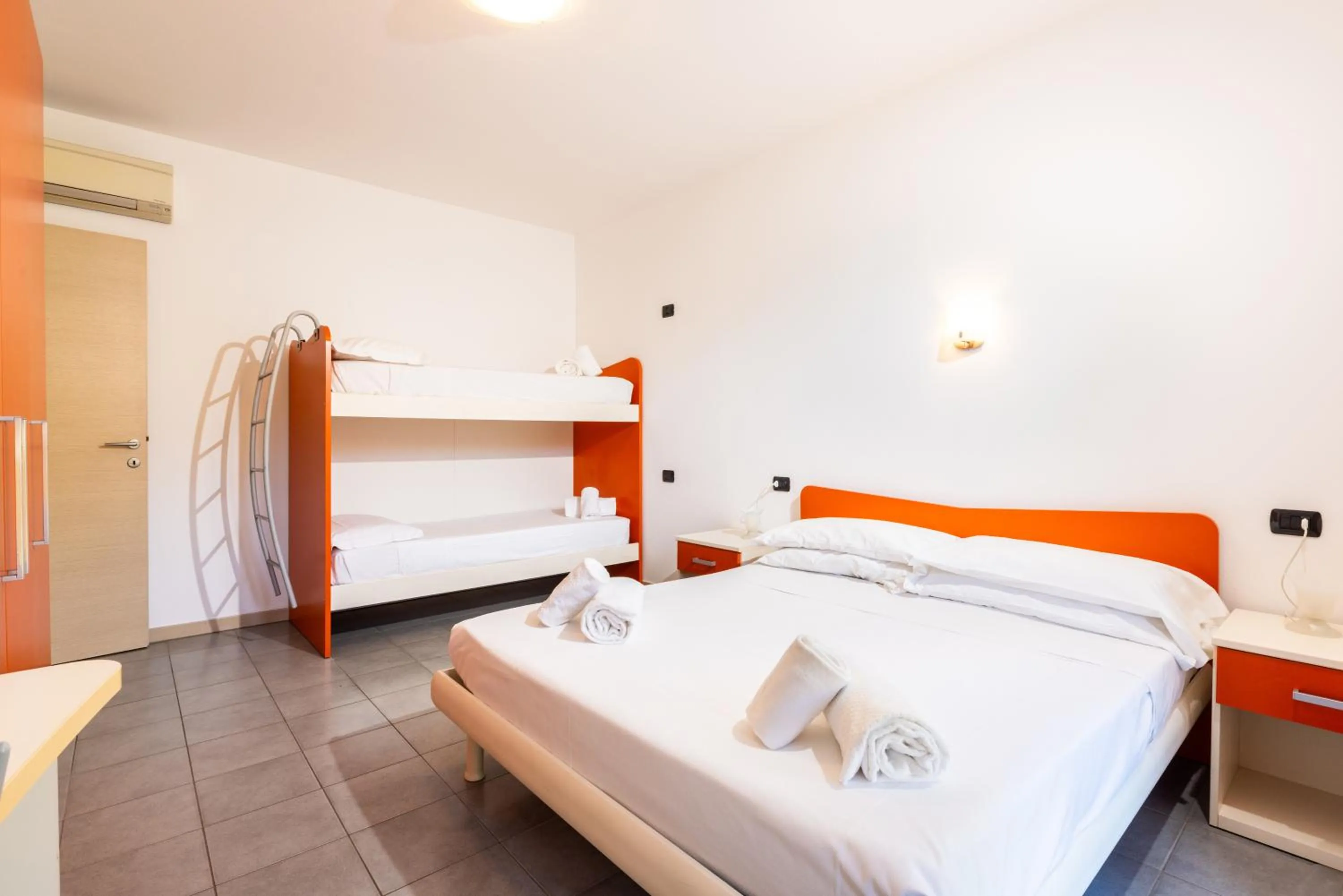 Bed in Spluga "Relax & Apartaments" by Alfio Colombo