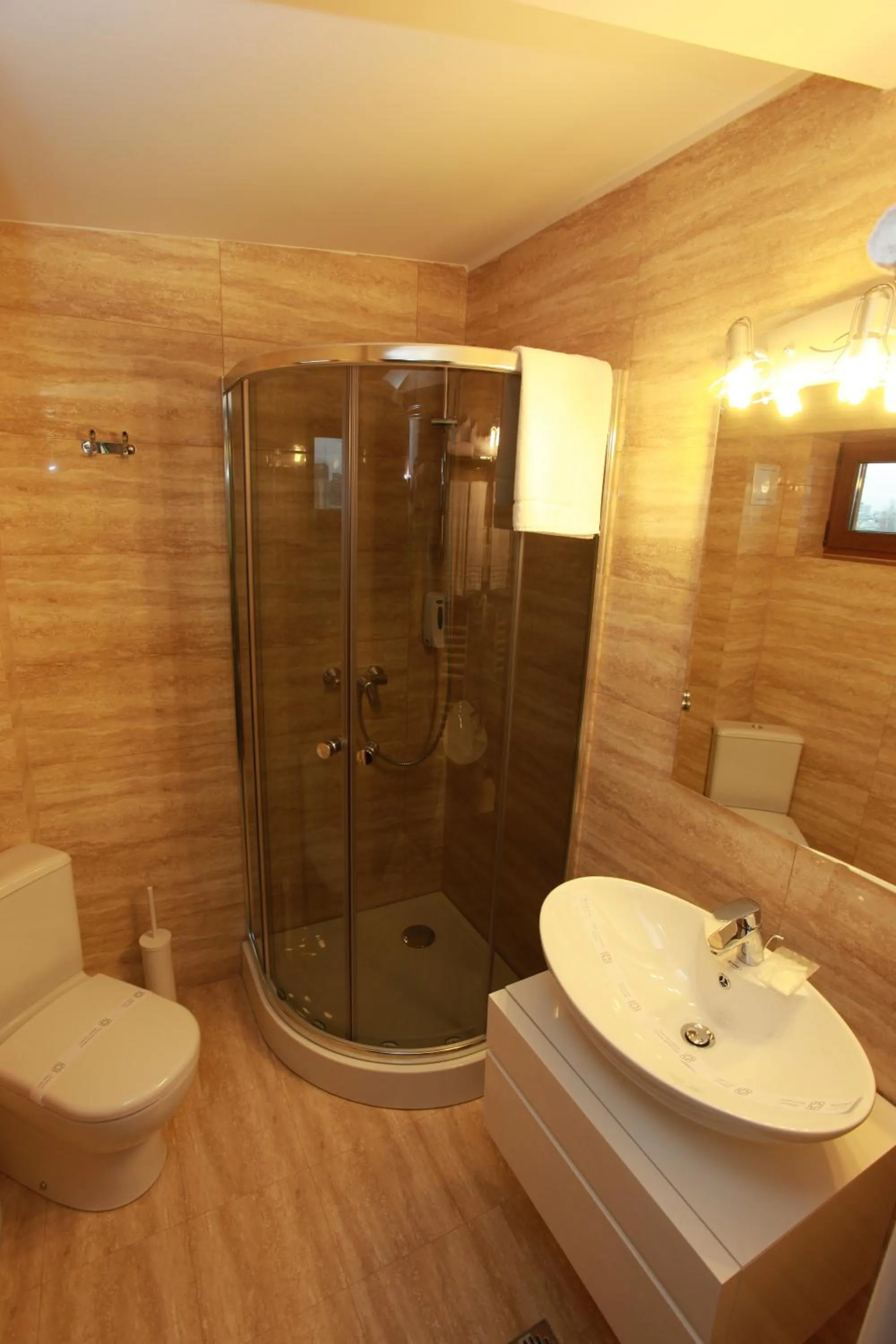 Bed in West Plaza Hotel