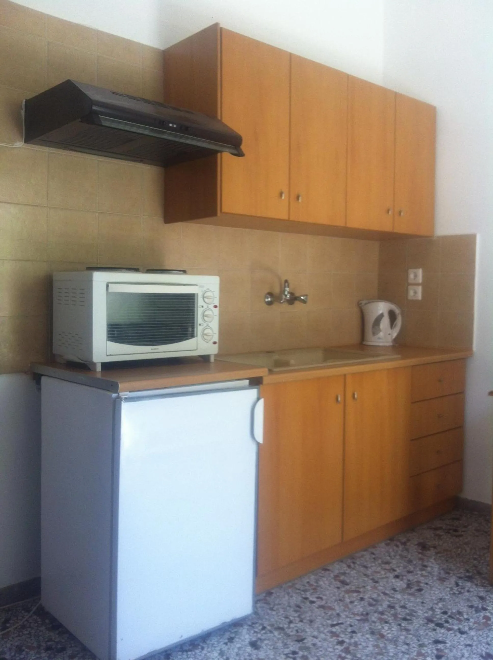 Kitchen or kitchenette in Nitsa Rooms