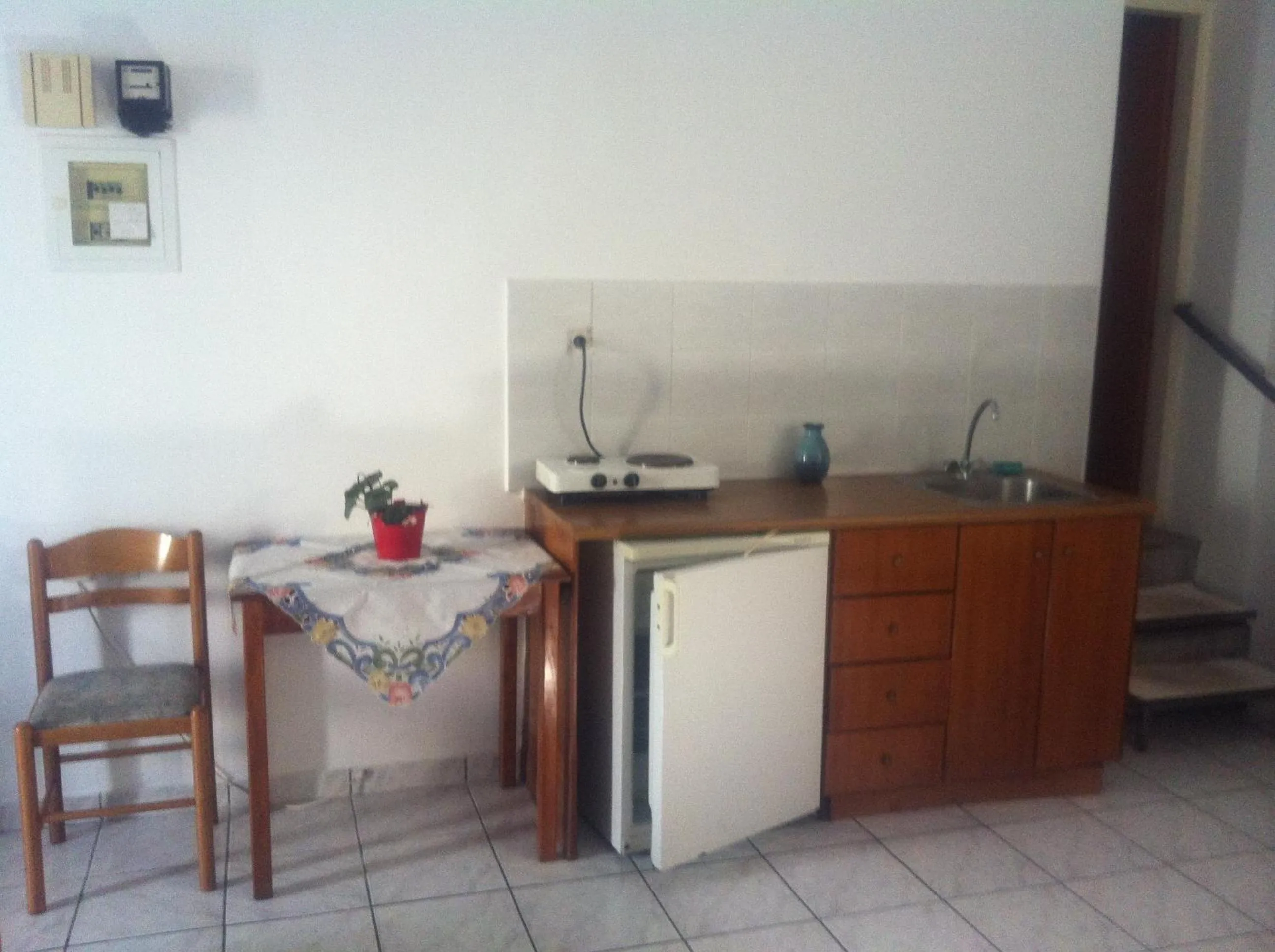 Kitchen or kitchenette in Nitsa Rooms