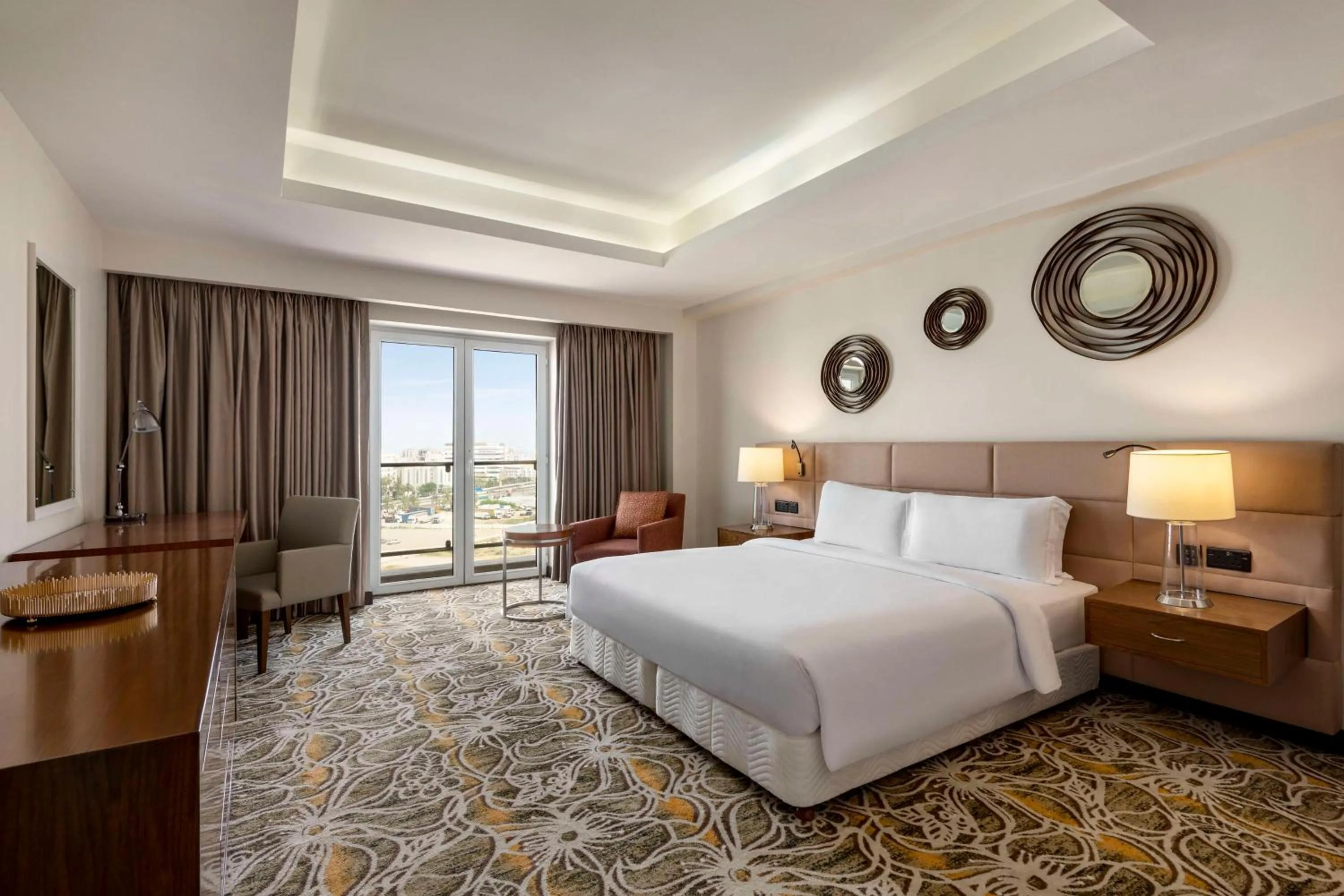 Photo of the whole room, Bed in Radisson Hotel Muscat Panorama