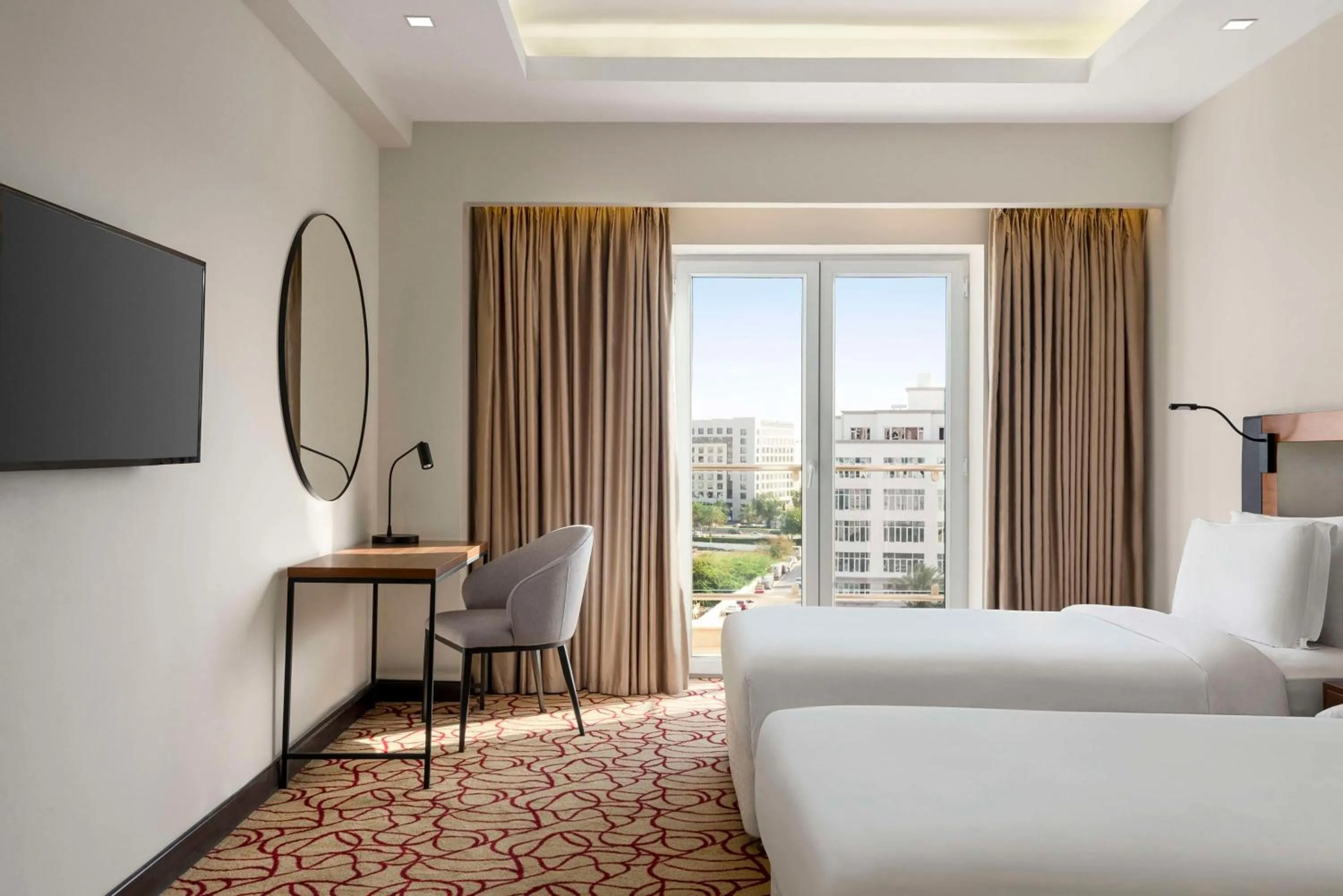 Photo of the whole room, Bed in Radisson Hotel Muscat Panorama