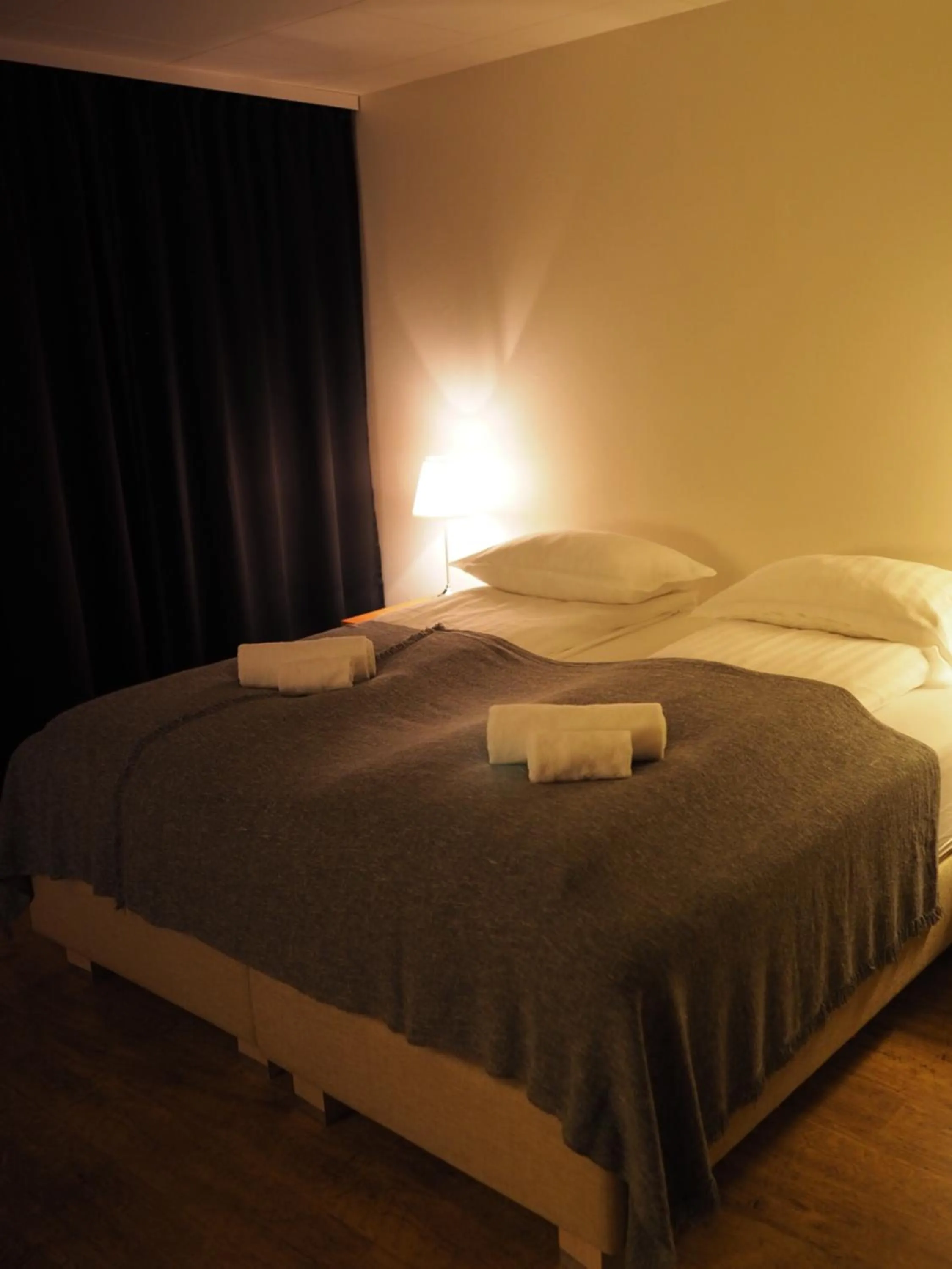 Bed in Fisherman Guesthouse Sudureyri