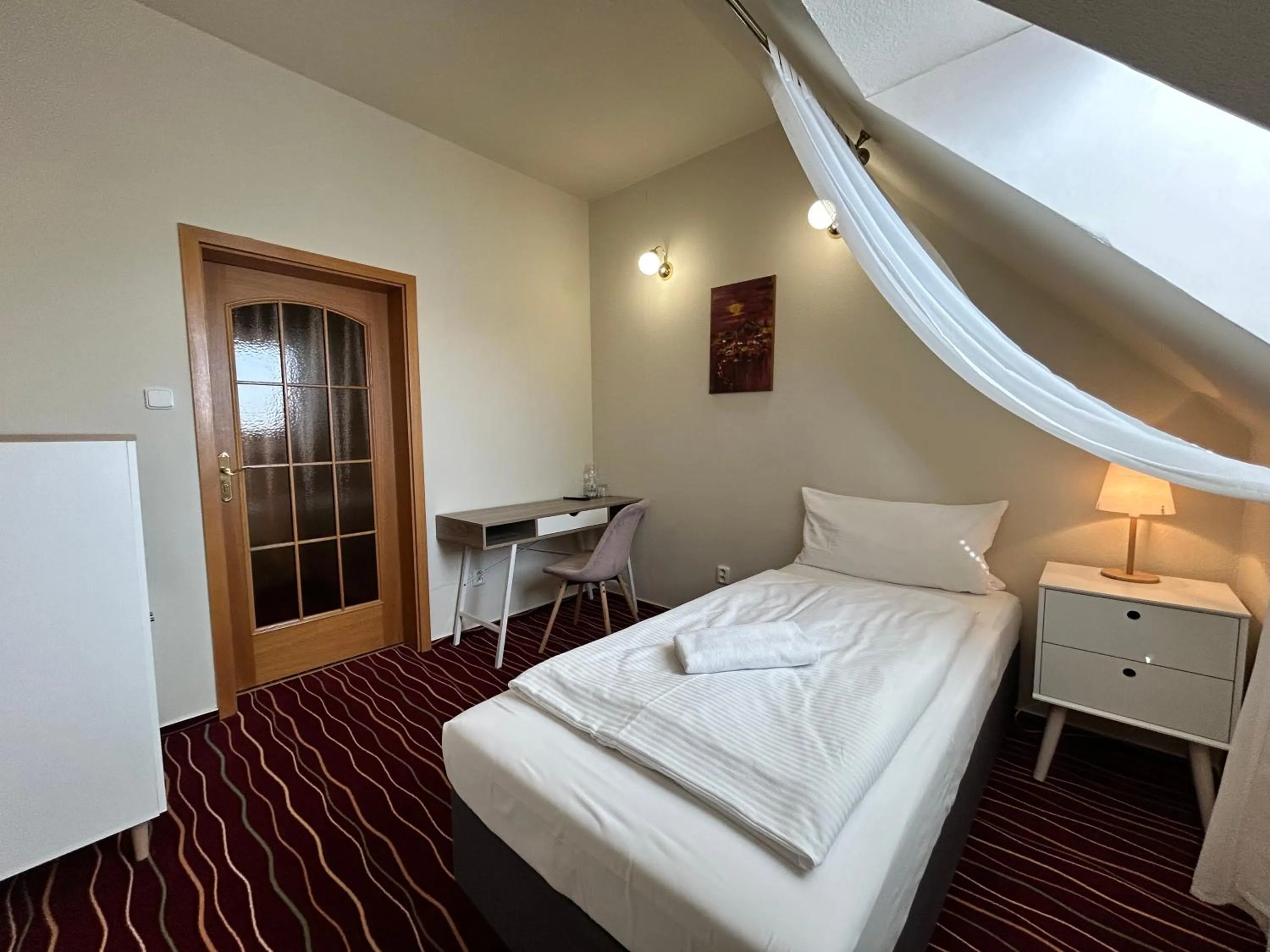 Bed in Hotel Brixen