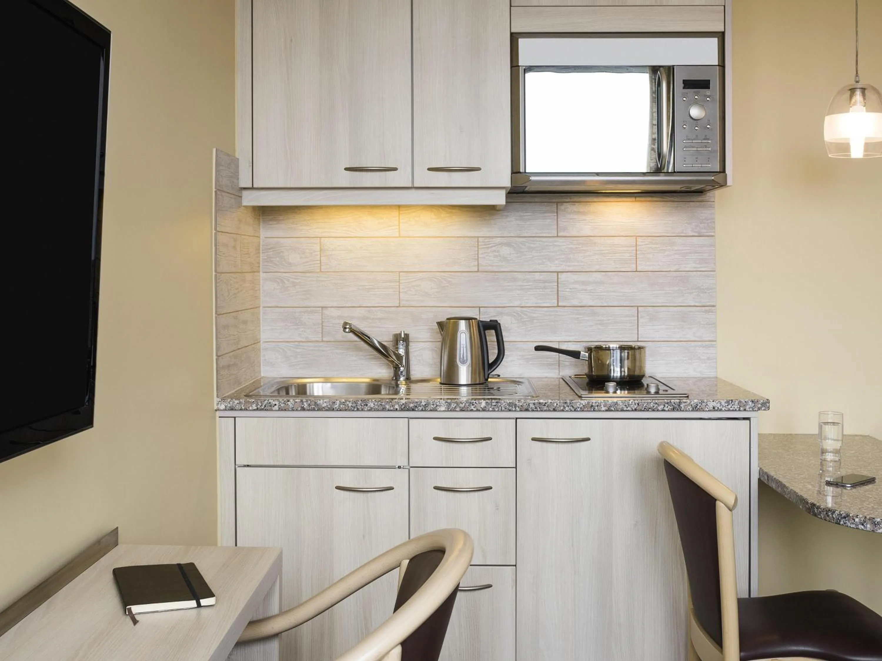 Bedroom in Aparthotel Adagio Genève Mont-Blanc