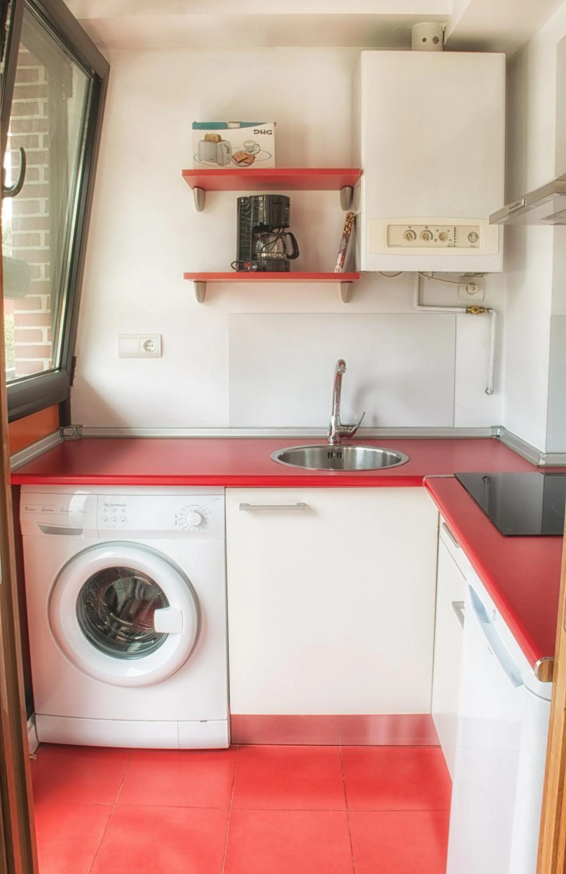 Kitchen or kitchenette in Apartamentos Bahía de Boó