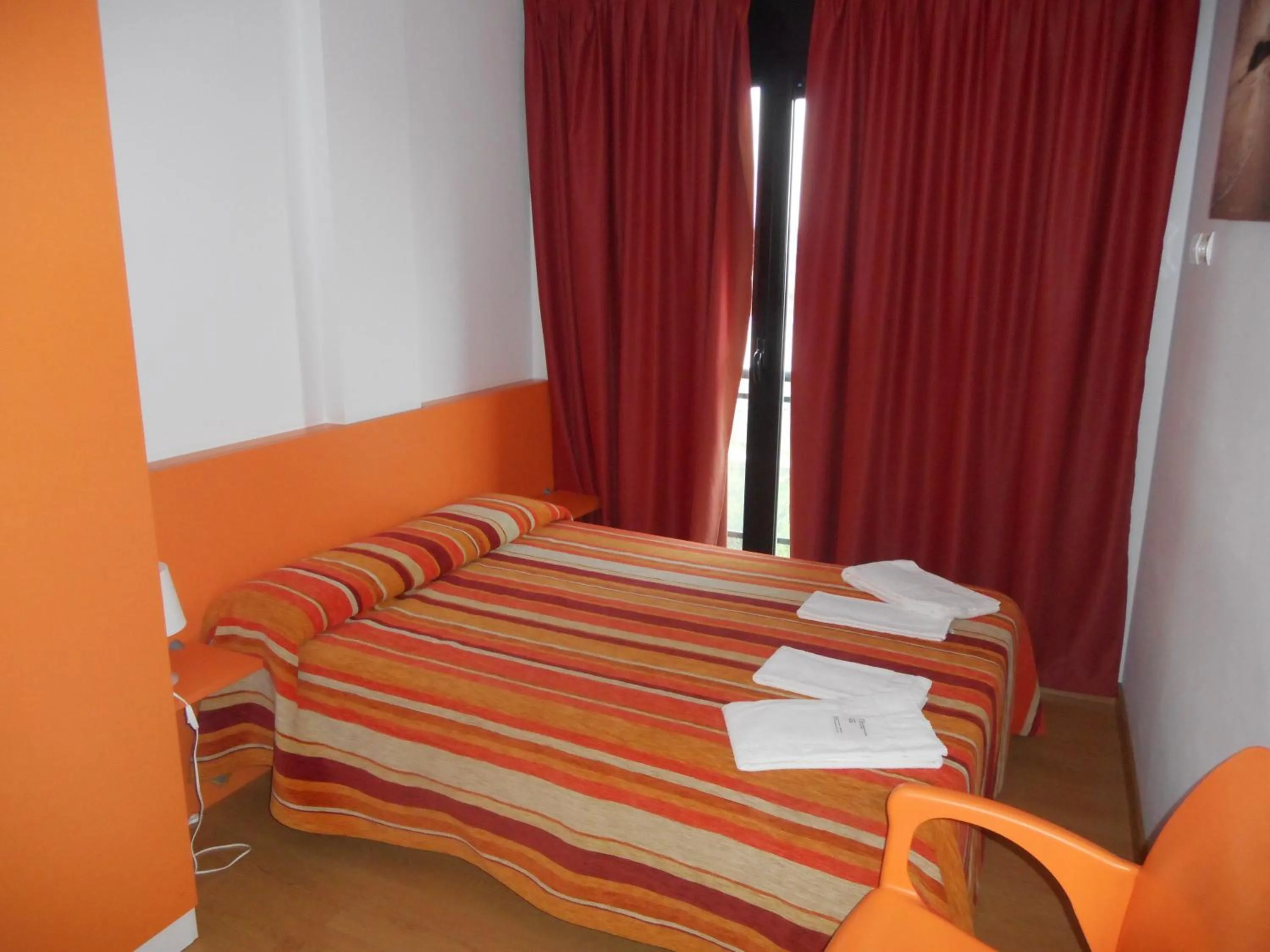 Bedroom, Bed in Apartamentos Bahía de Boó