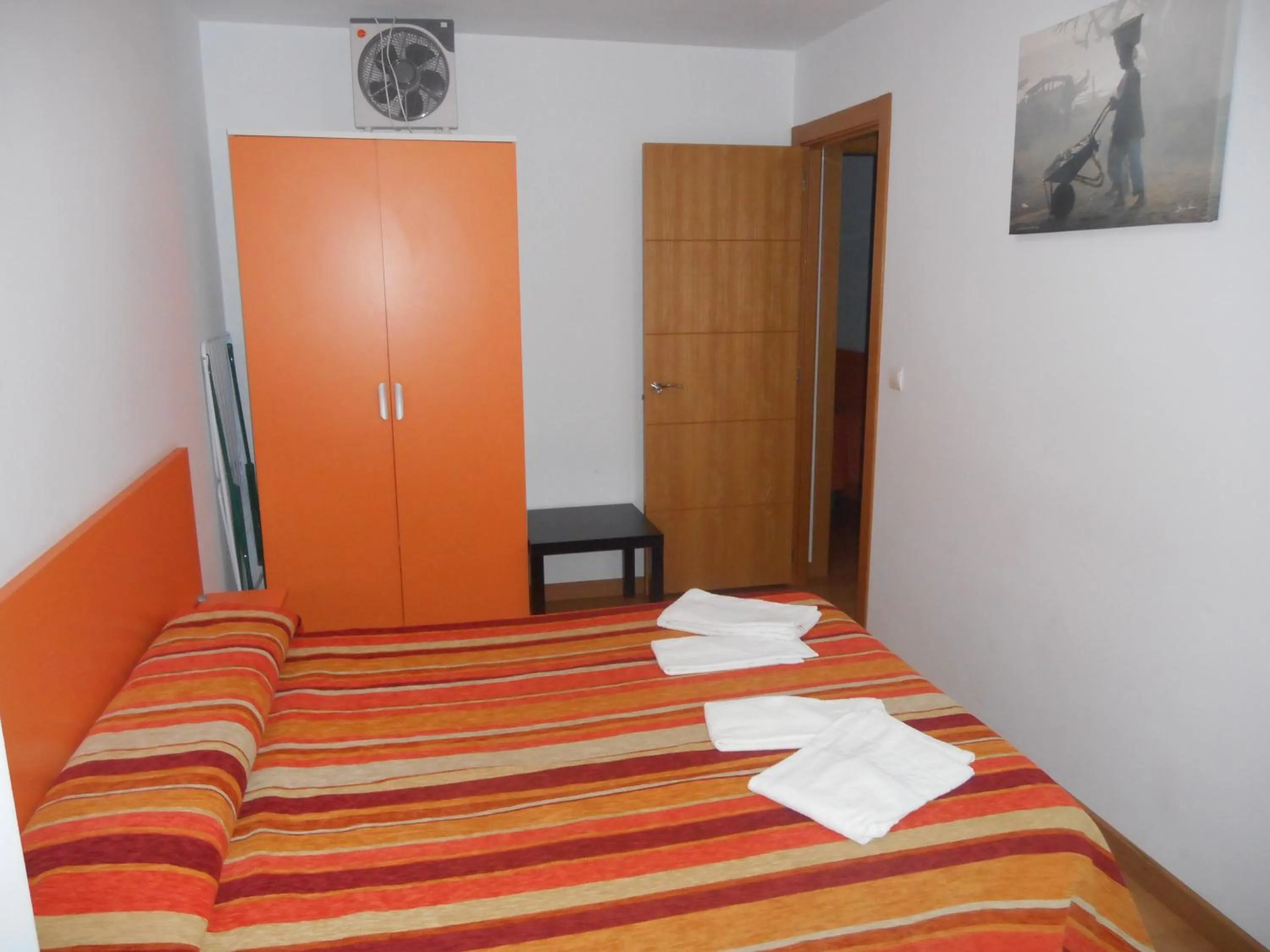 Bedroom, Bed in Apartamentos Bahía de Boó