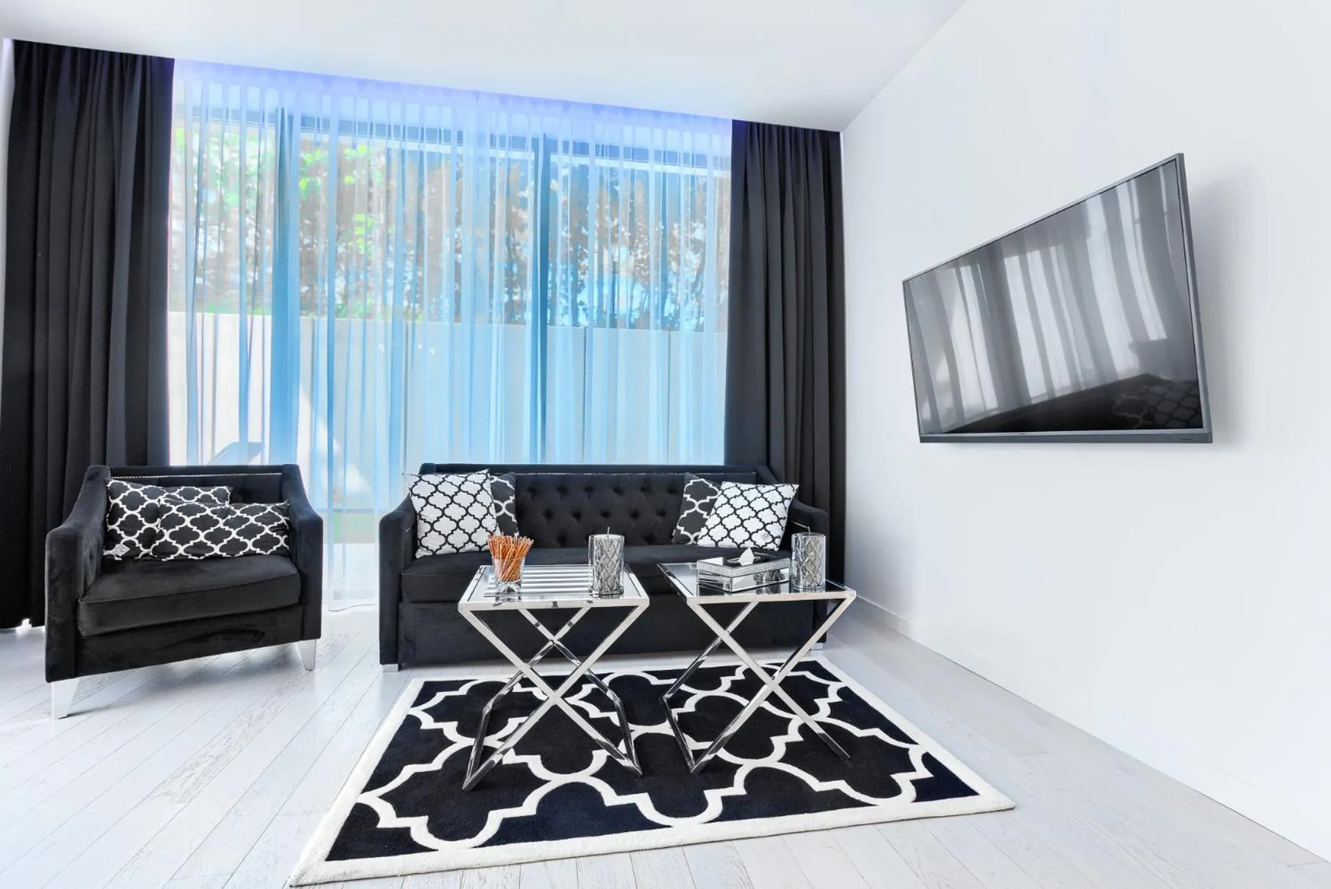 Communal lounge/ TV room in Dune Resort Mielno - B