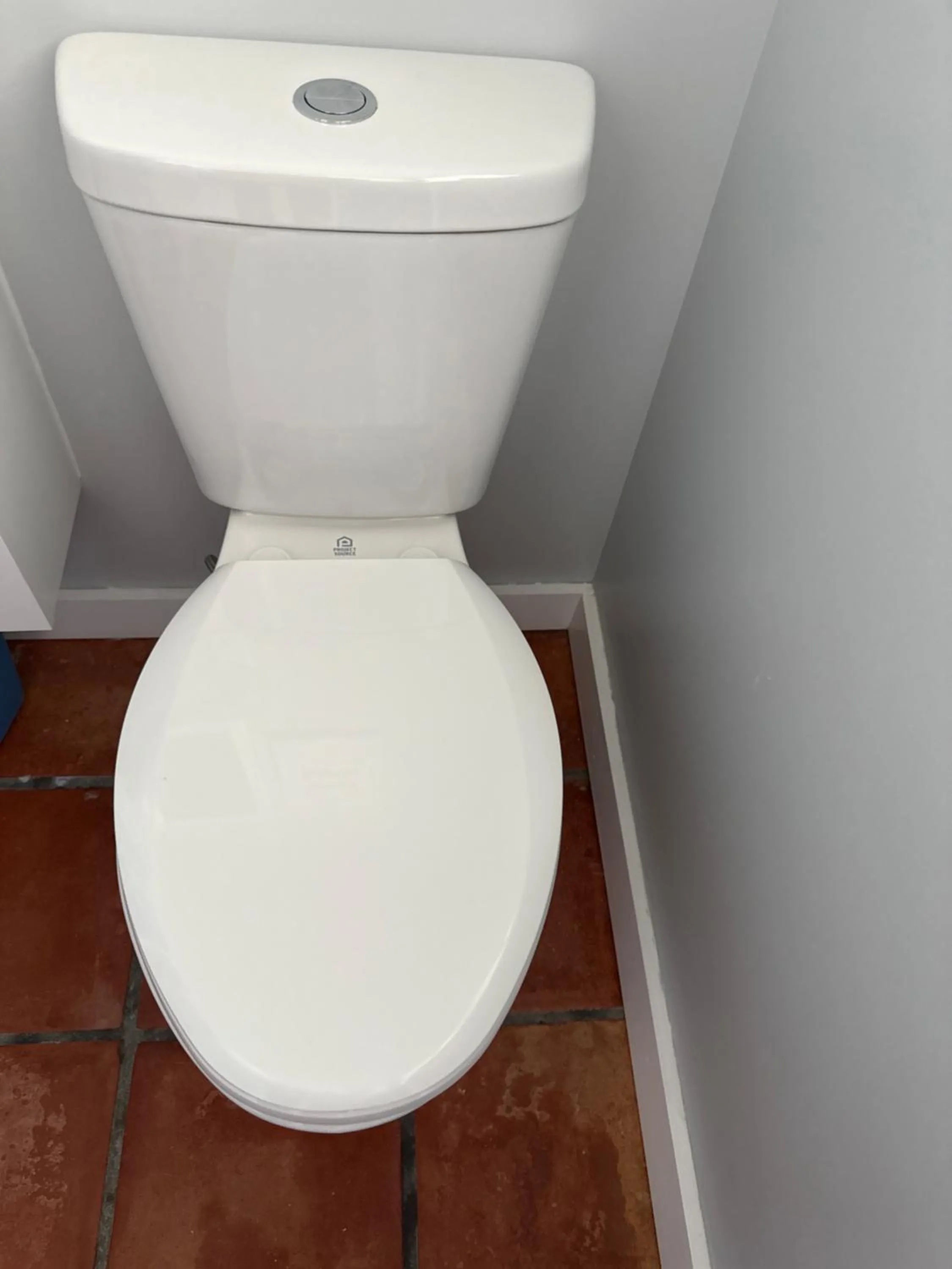 Toilet in Barefoot Bay Resort Motel