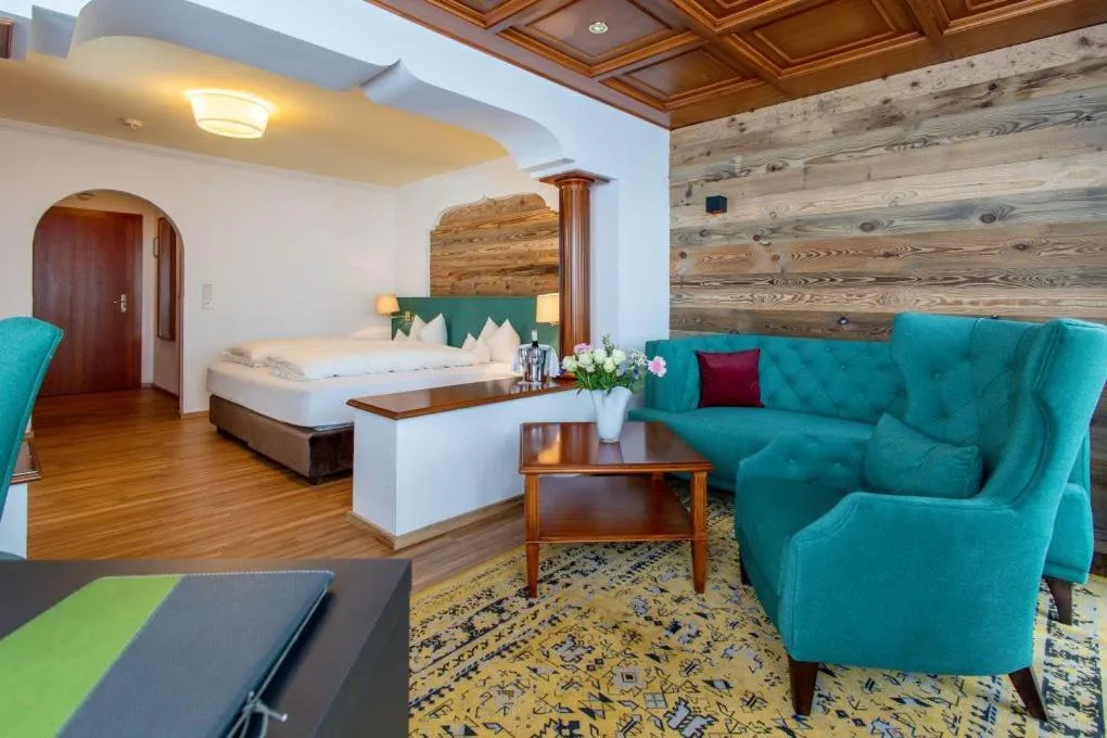 Seating area, Bed in Hotel Seelos