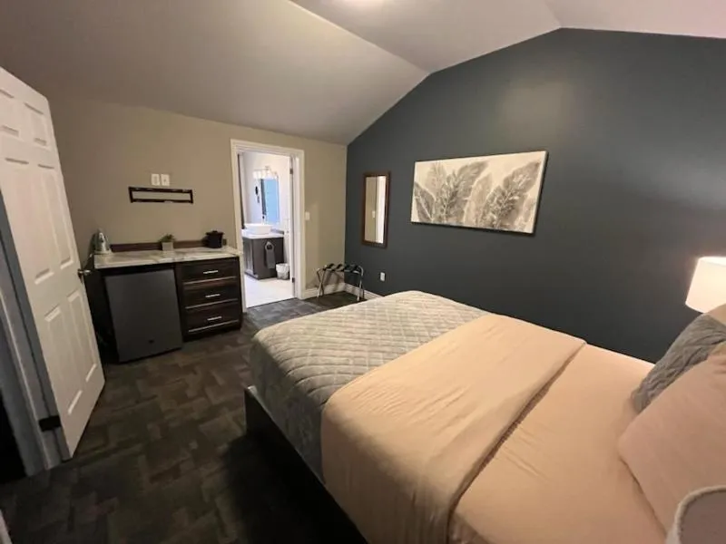 Bed in Newfound Inn & Suites