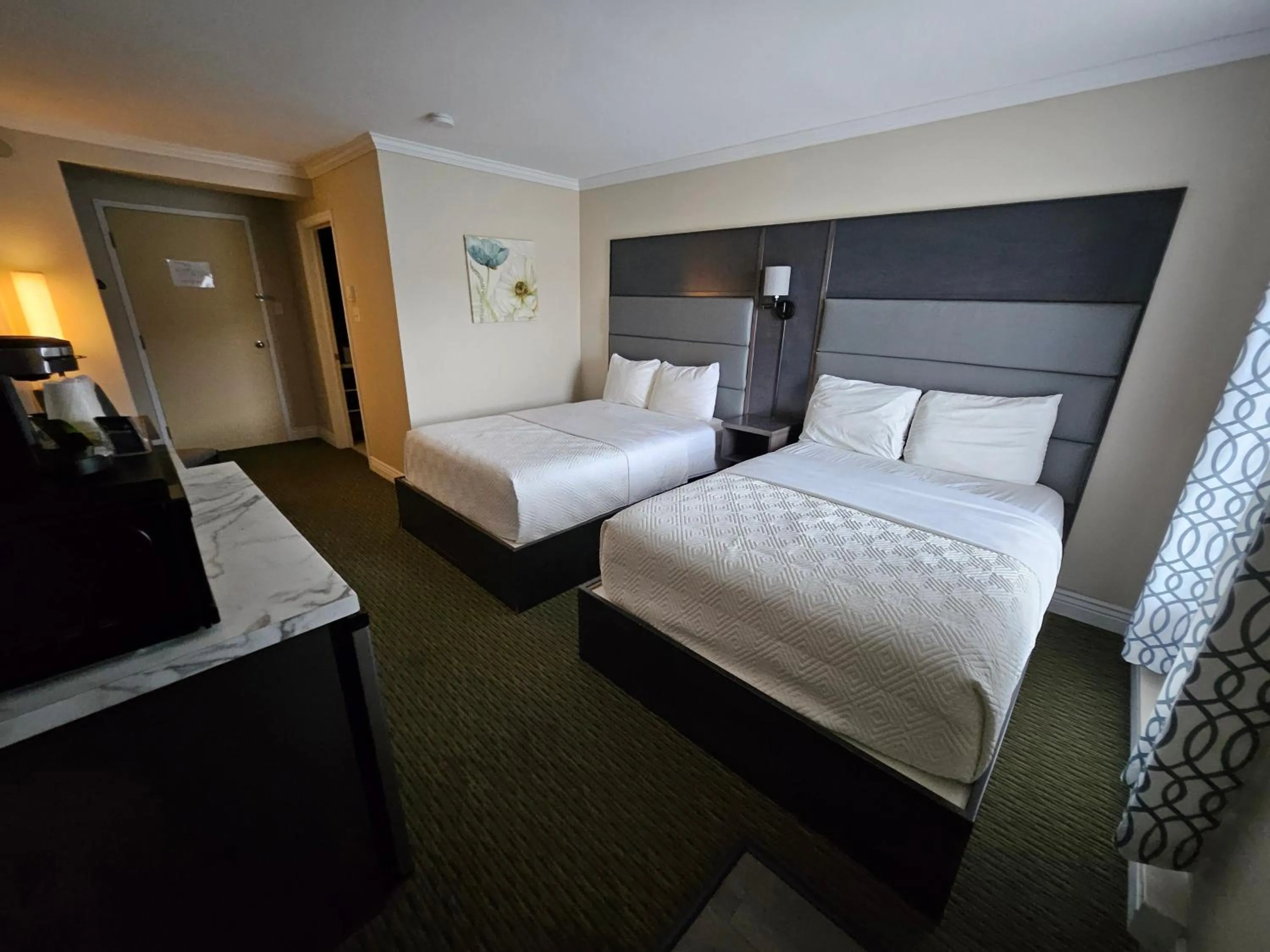 Bed in Newfound Inn & Suites