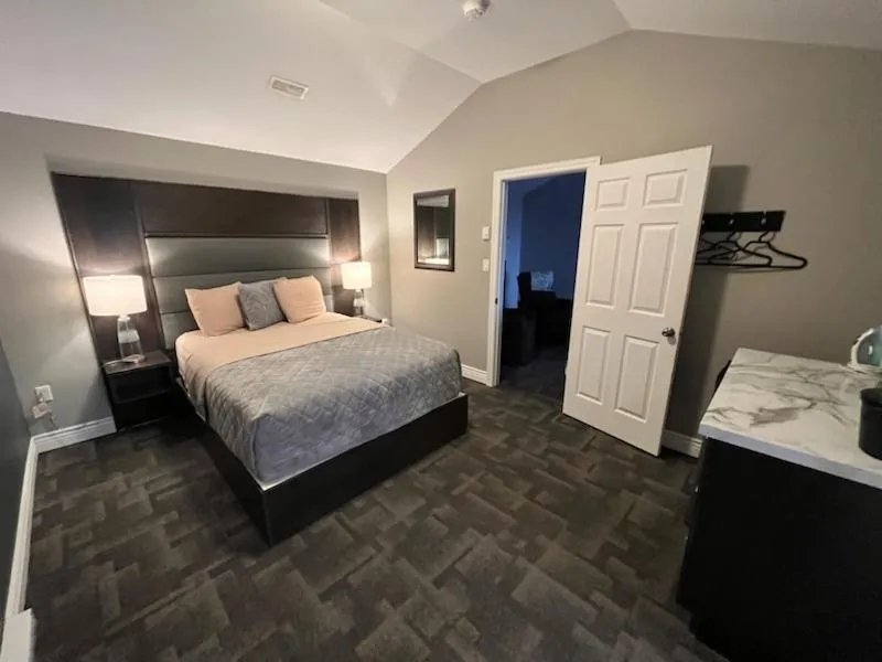 Bed in Newfound Inn & Suites