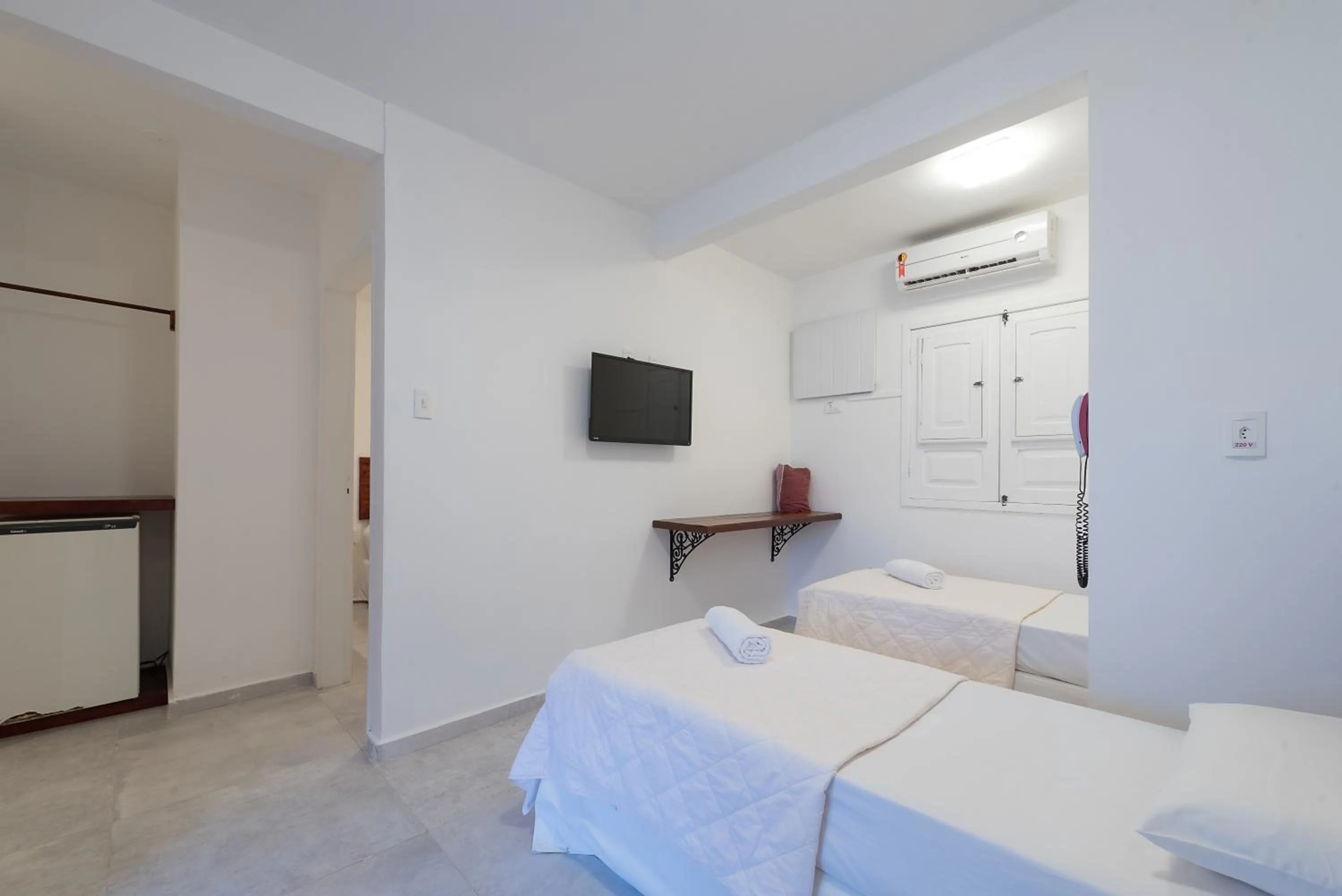 Bed in Pousada Quatro Estações