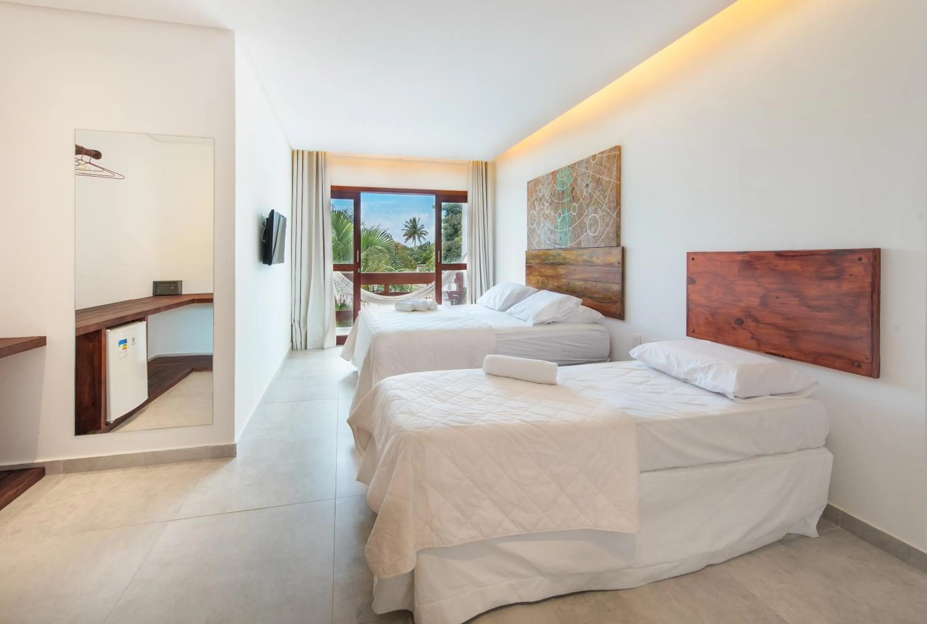 Bed in Pousada Quatro Estações