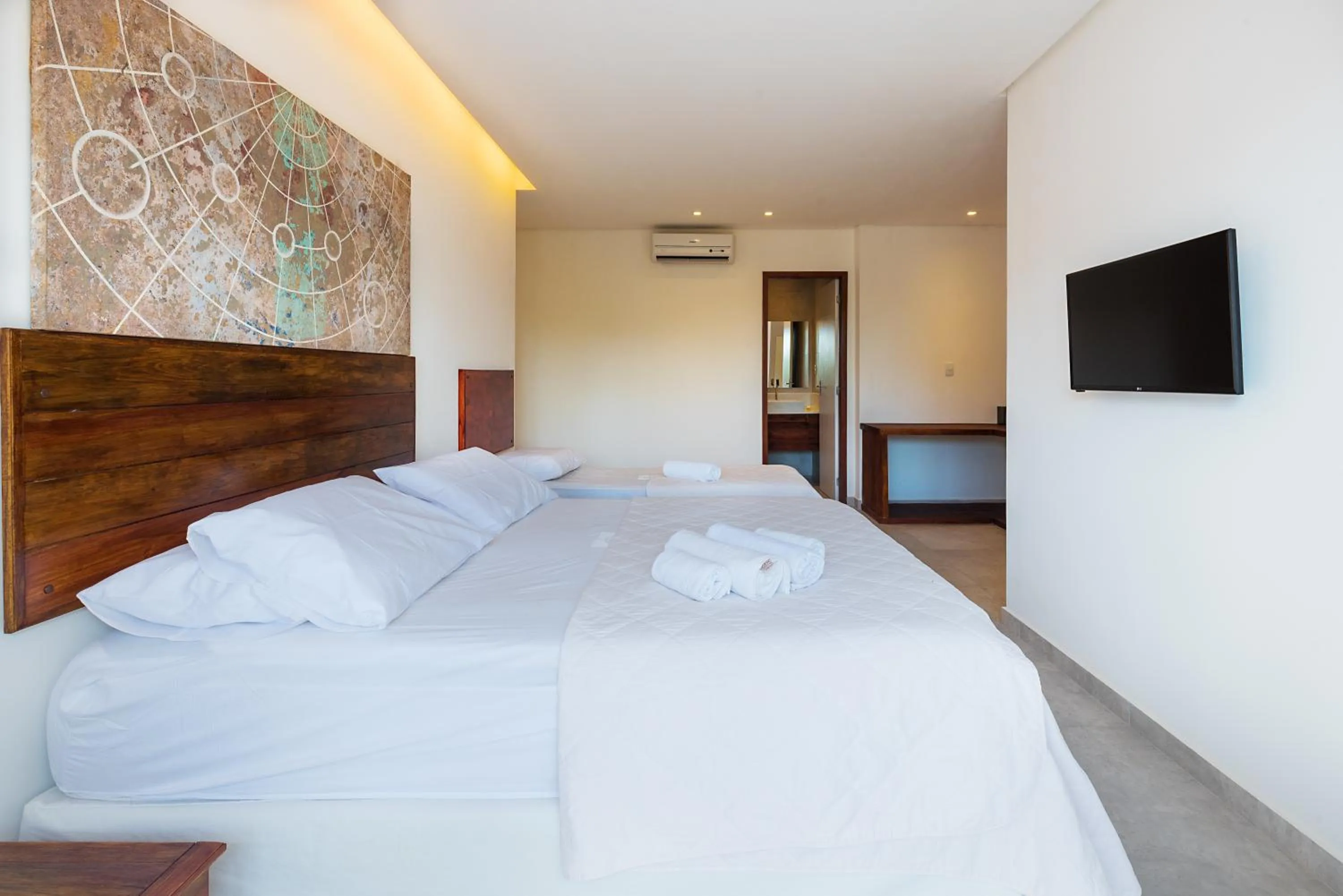 Bed in Pousada Quatro Estações