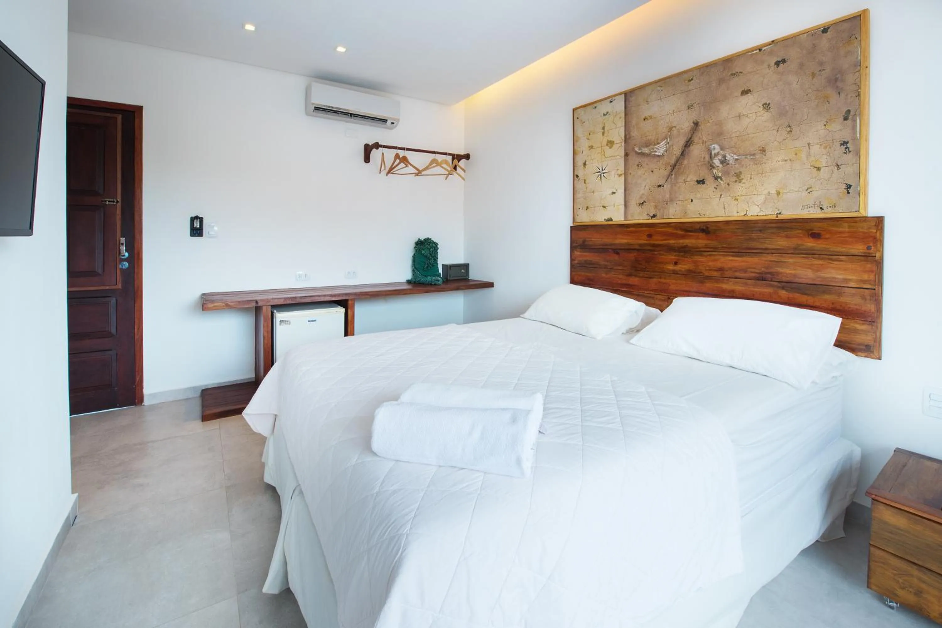 Bed in Pousada Quatro Estações