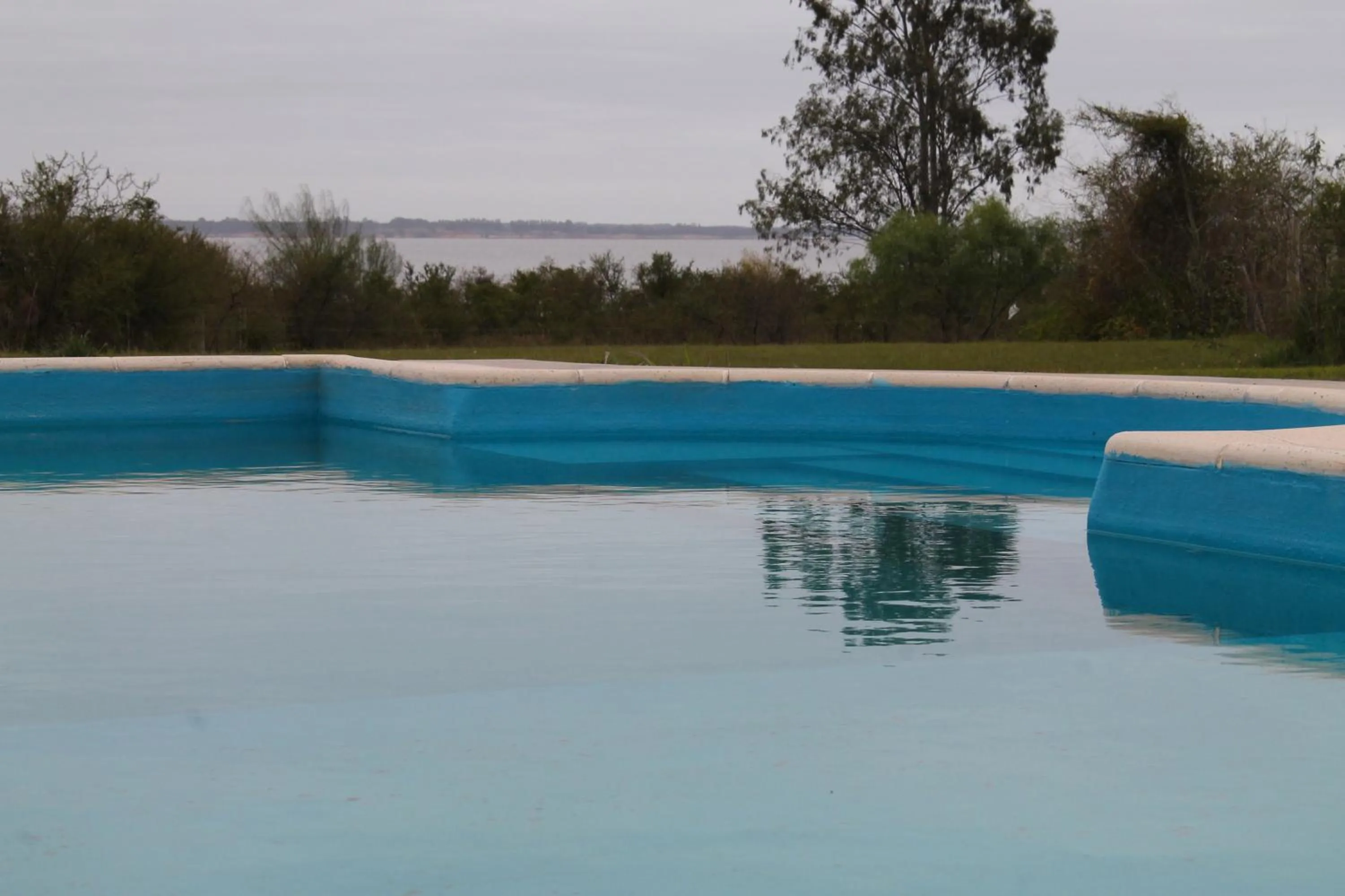 Swimming pool in Brisas del Lago Apart y Hotel