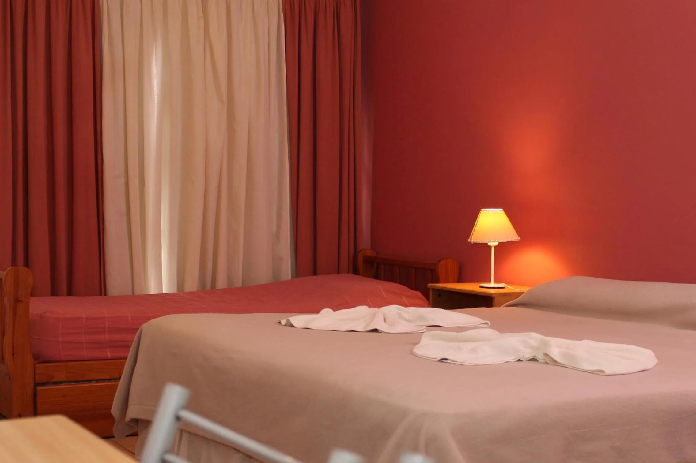 Bed in Brisas del Lago Apart y Hotel