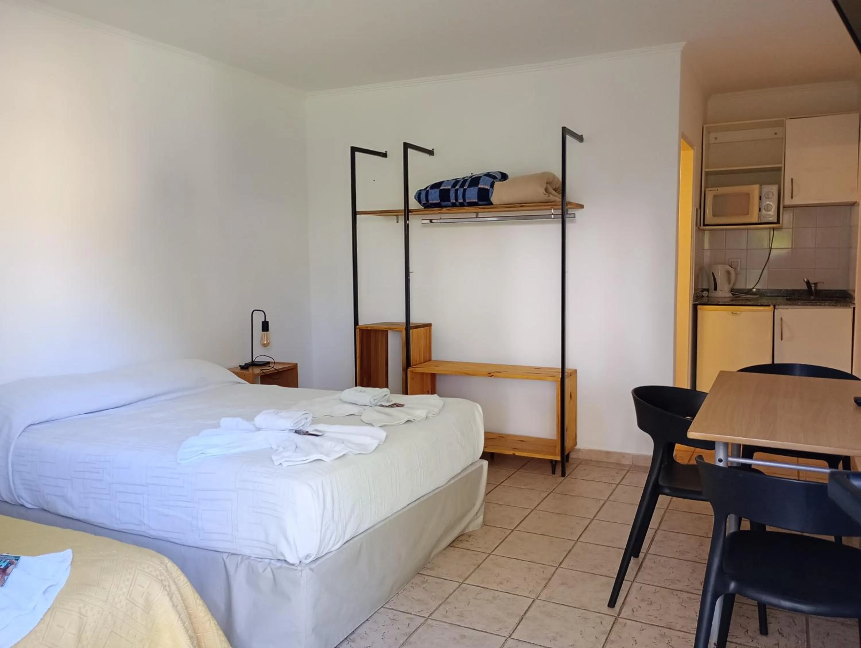 Bed in Brisas del Lago Apart y Hotel