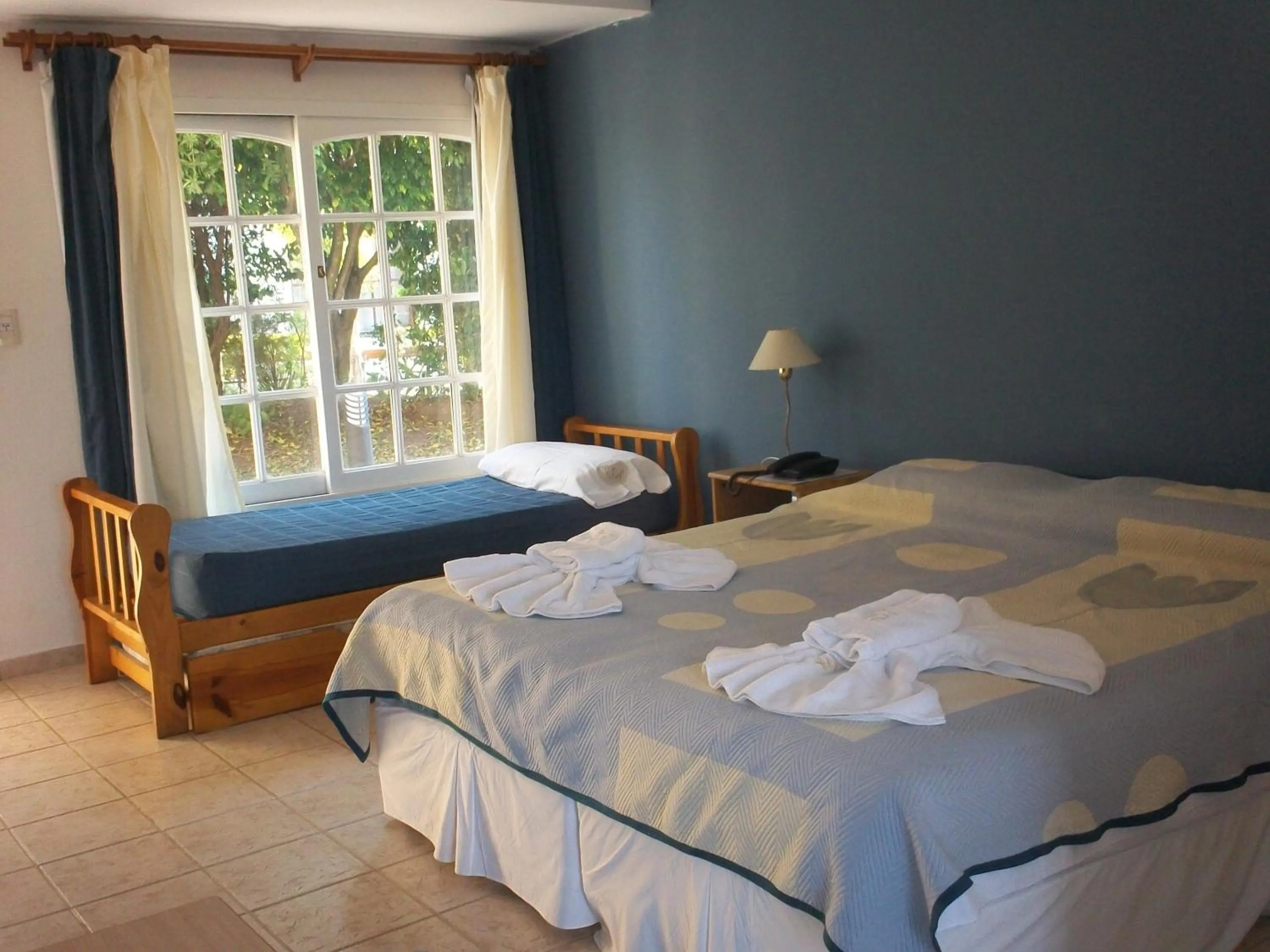 Bed in Brisas del Lago Apart y Hotel