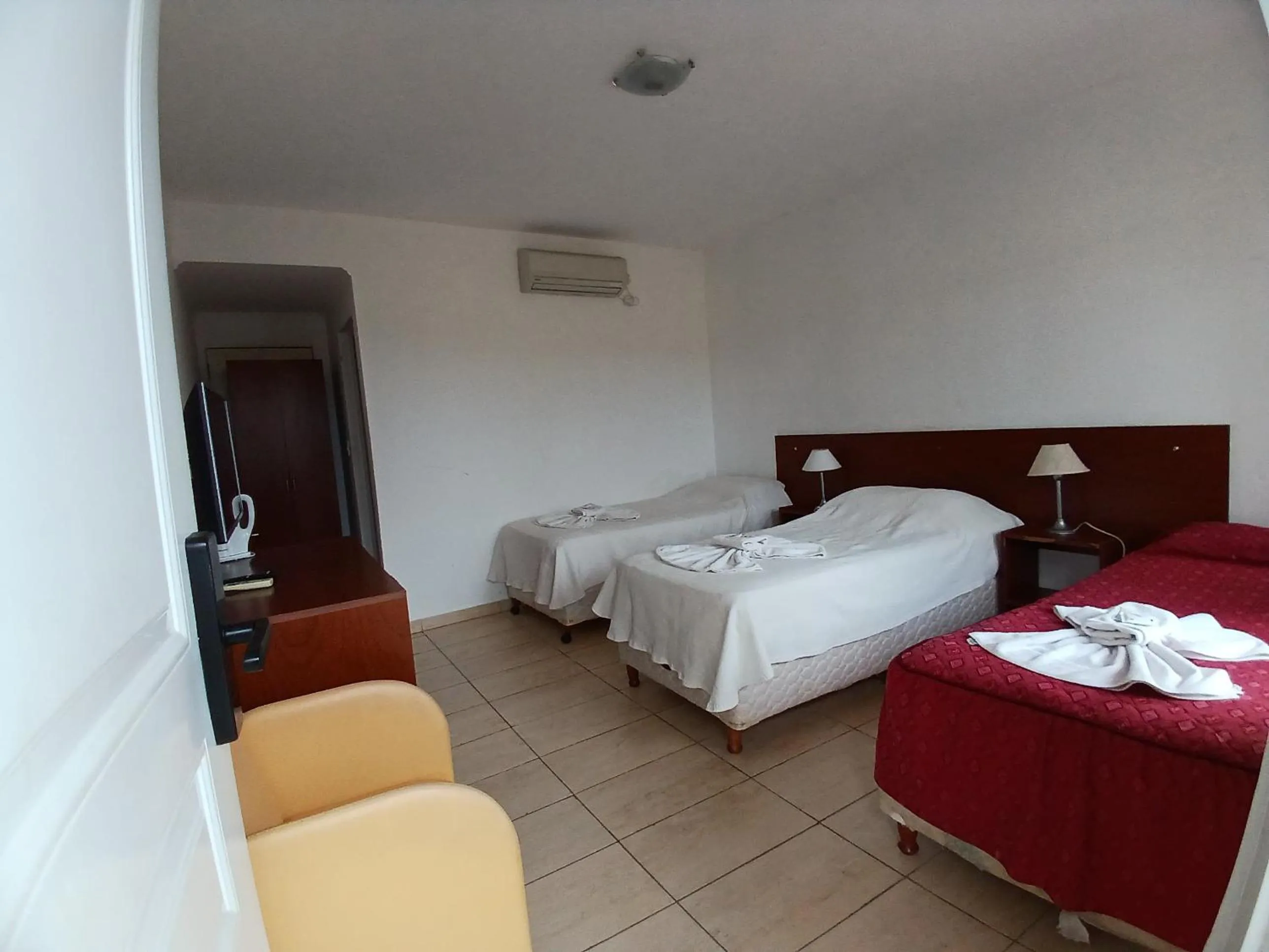 Bed in Brisas del Lago Apart y Hotel