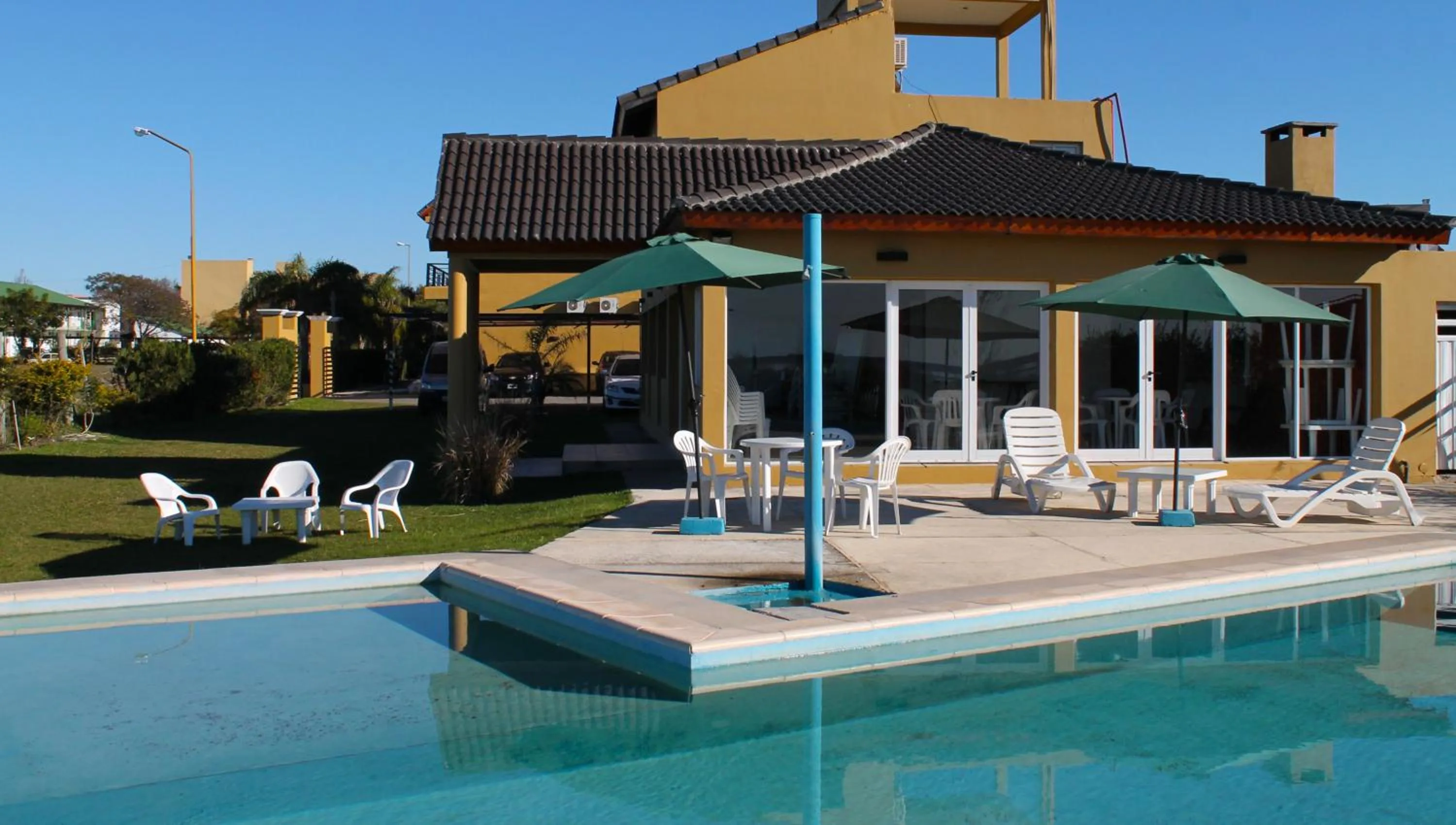 Swimming pool in Brisas del Lago Apart y Hotel