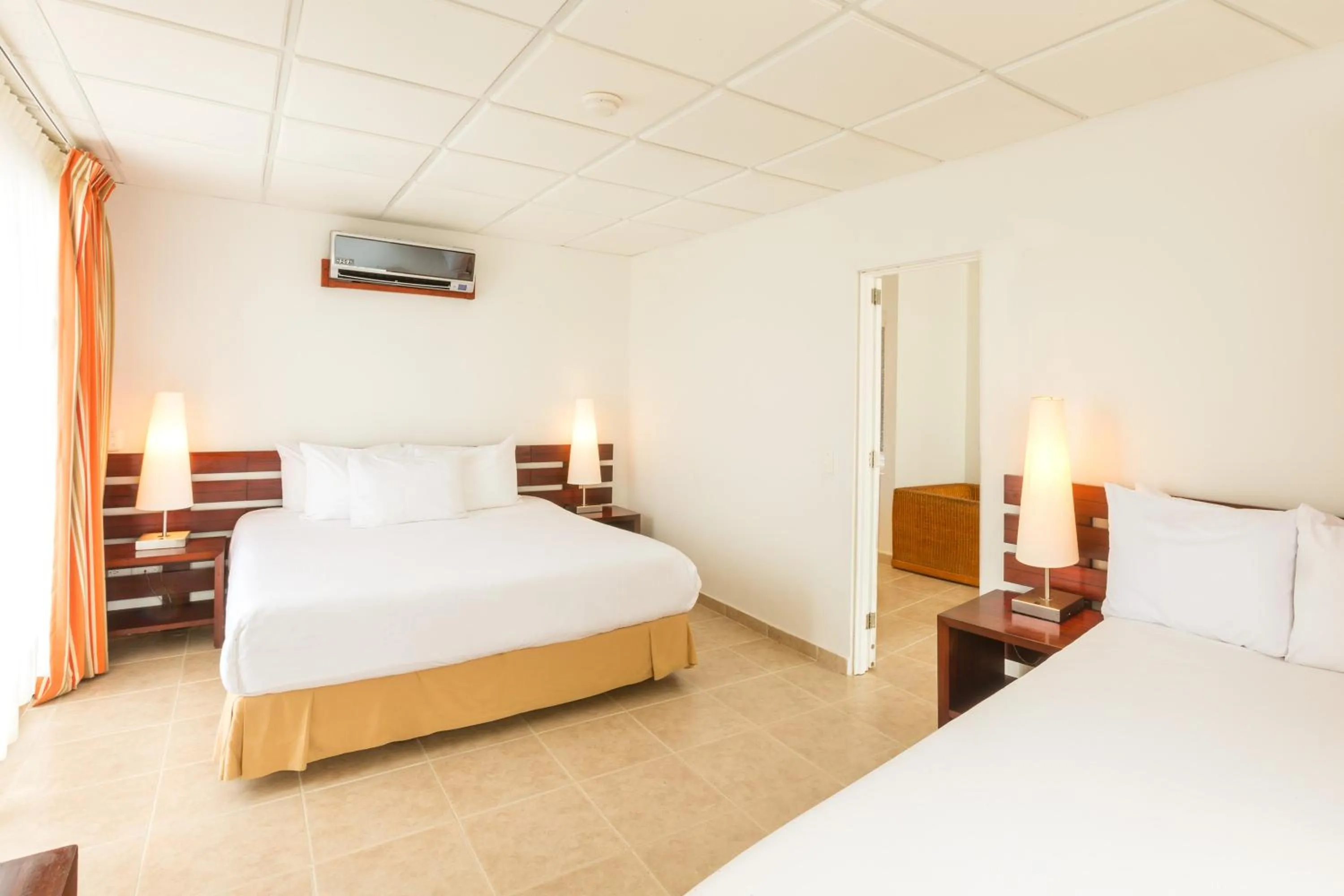 Bed in Decameron Los Delfines - All Inclusive