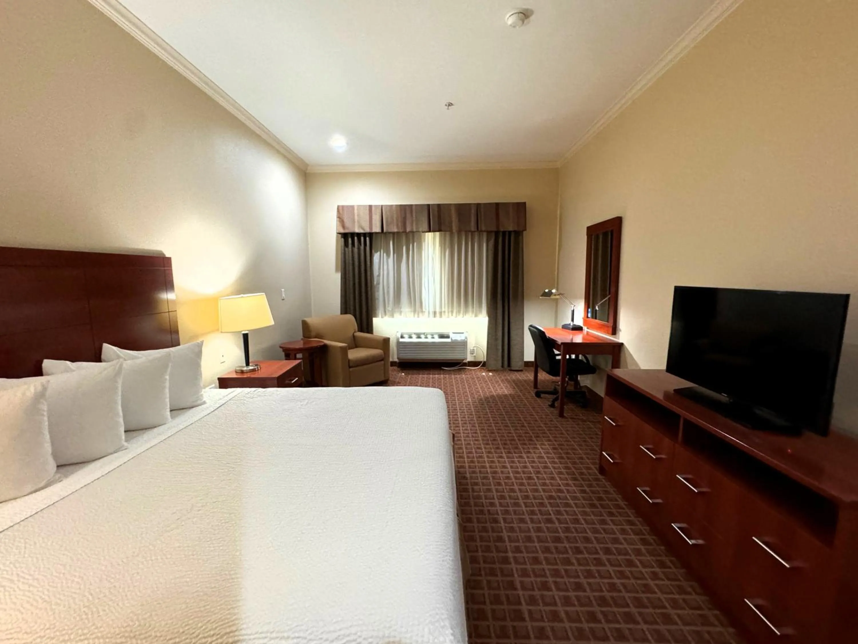 Photo of the whole room, Bed in Ramada by Wyndham College Station