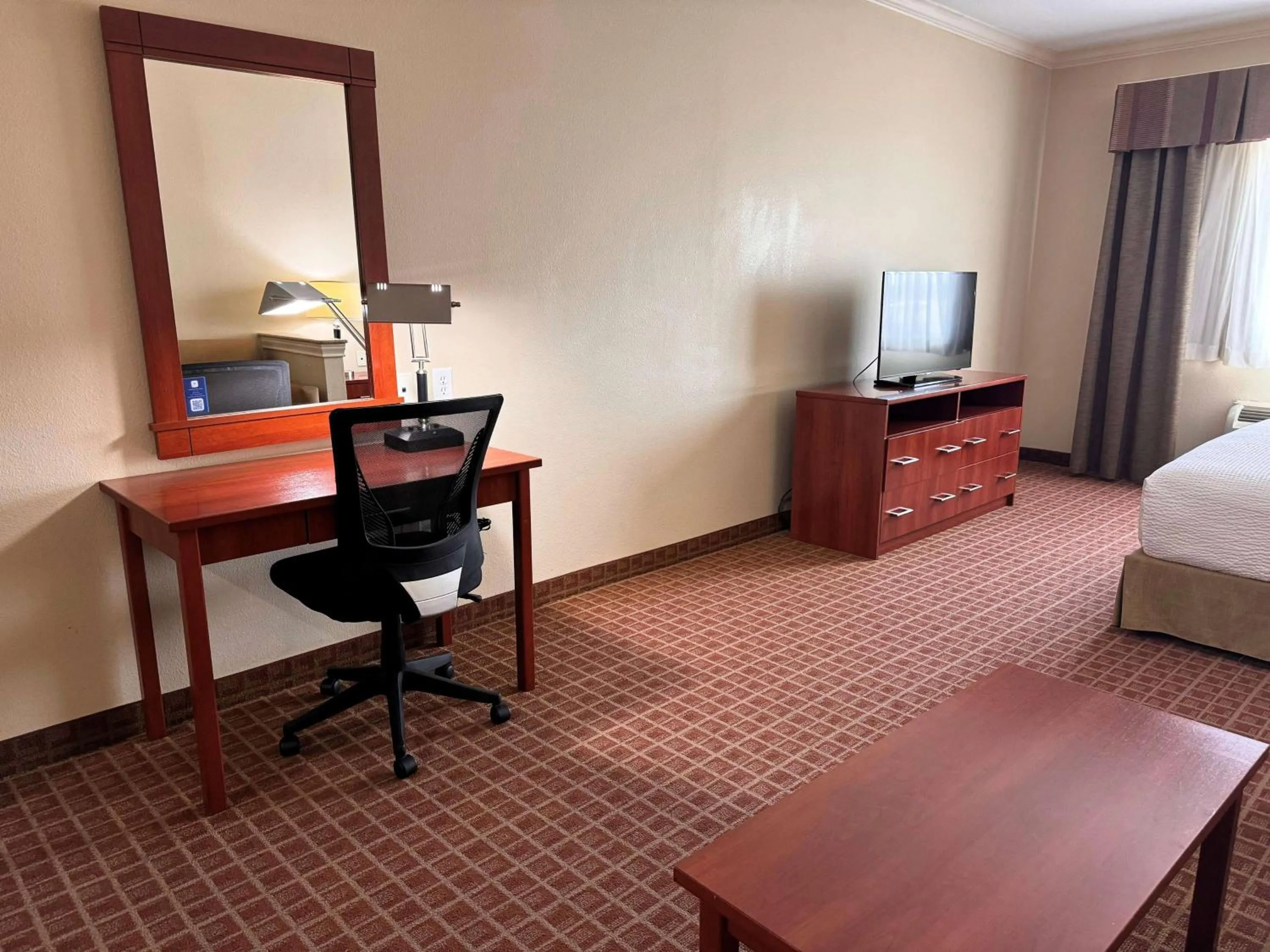 Photo of the whole room, Bed in Ramada by Wyndham College Station
