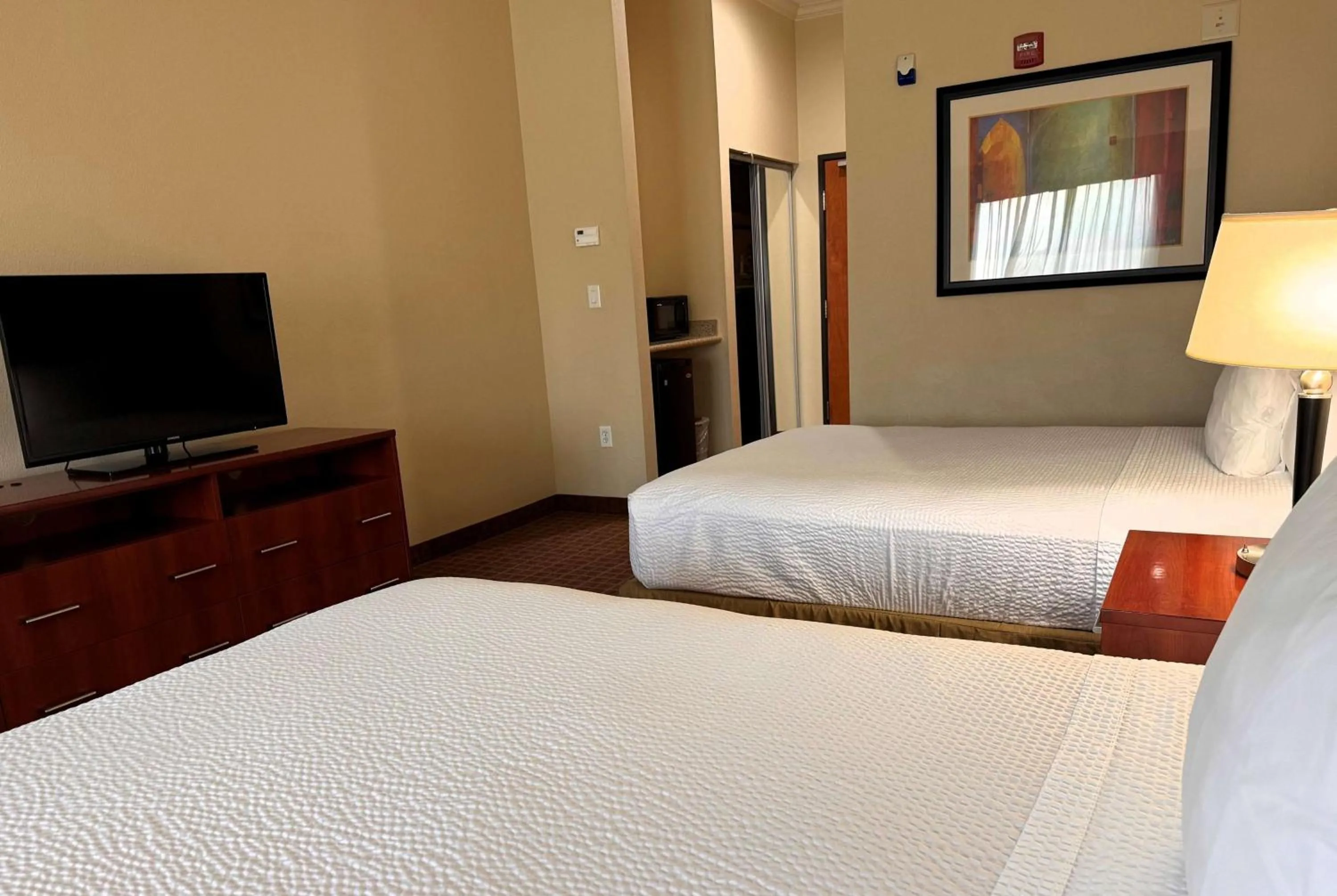 Photo of the whole room, Bed in Ramada by Wyndham College Station