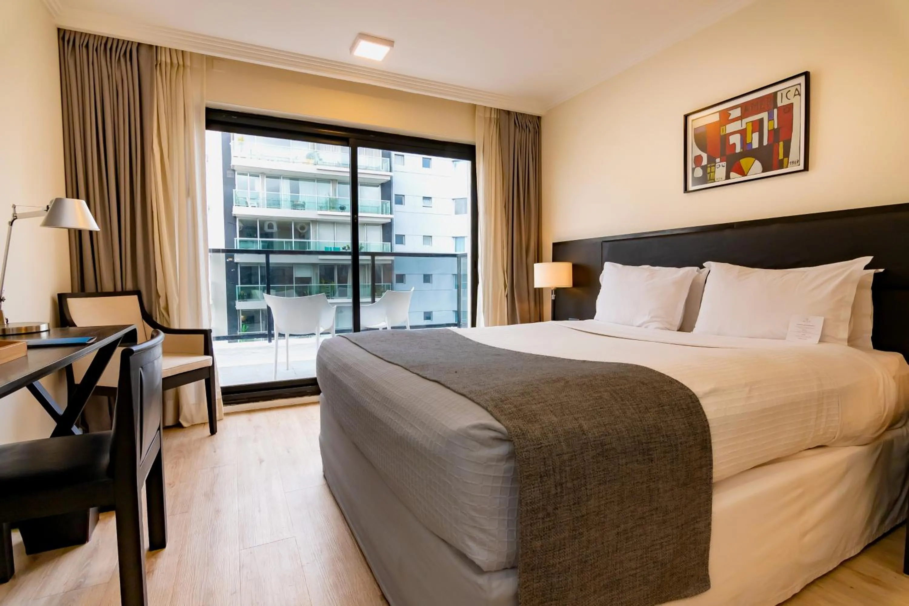 Photo of the whole room, Bed in After Hotel Montevideo