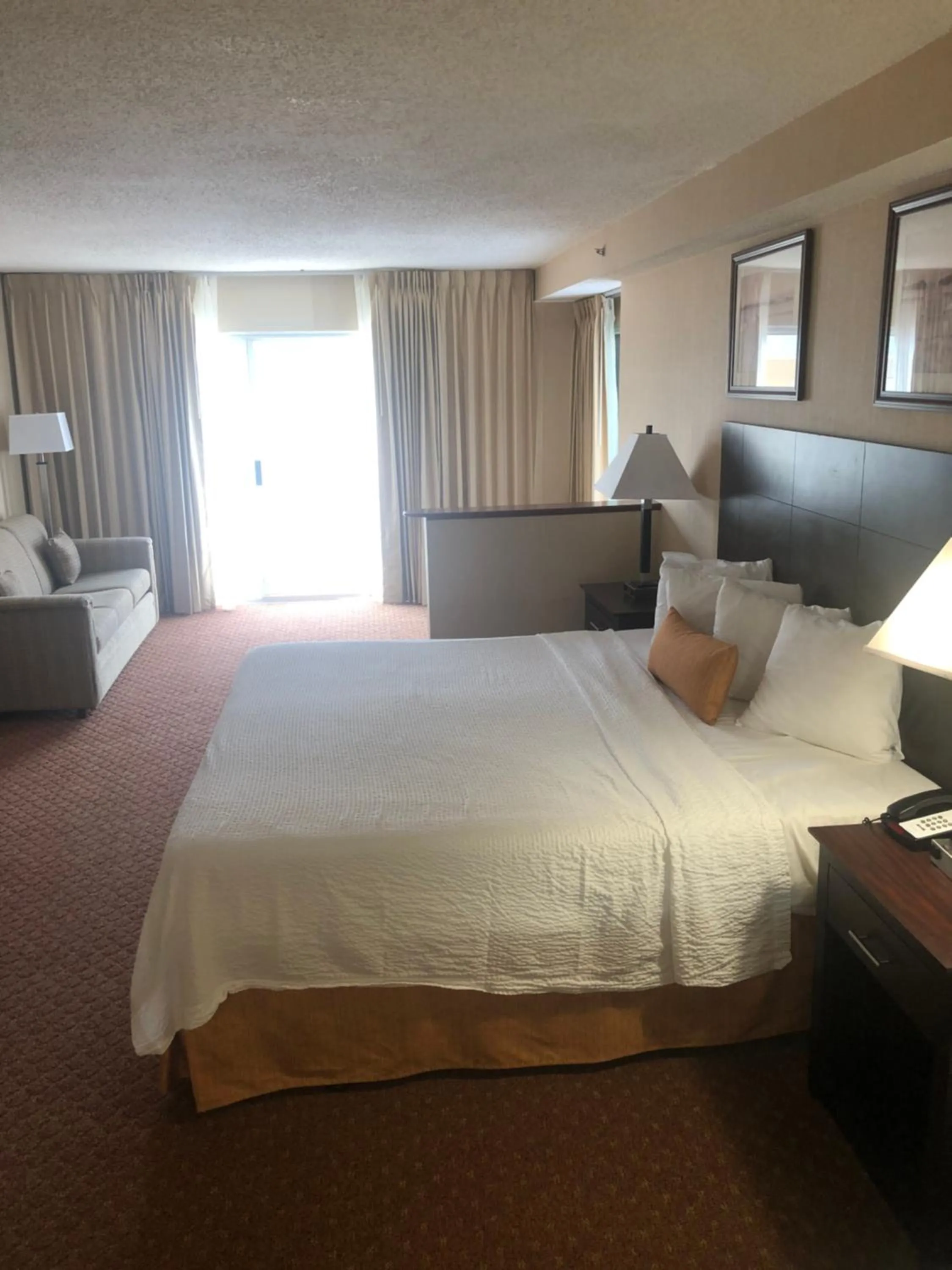 Seating area, Bed in Princess Bayside Beach Hotel