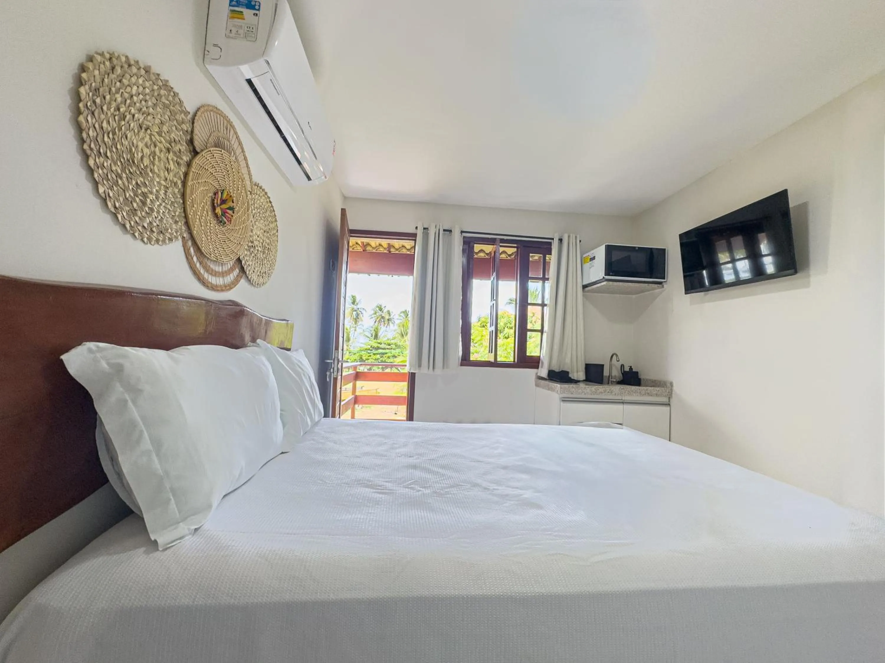 Photo of the whole room, Bed in Chales Maragogi