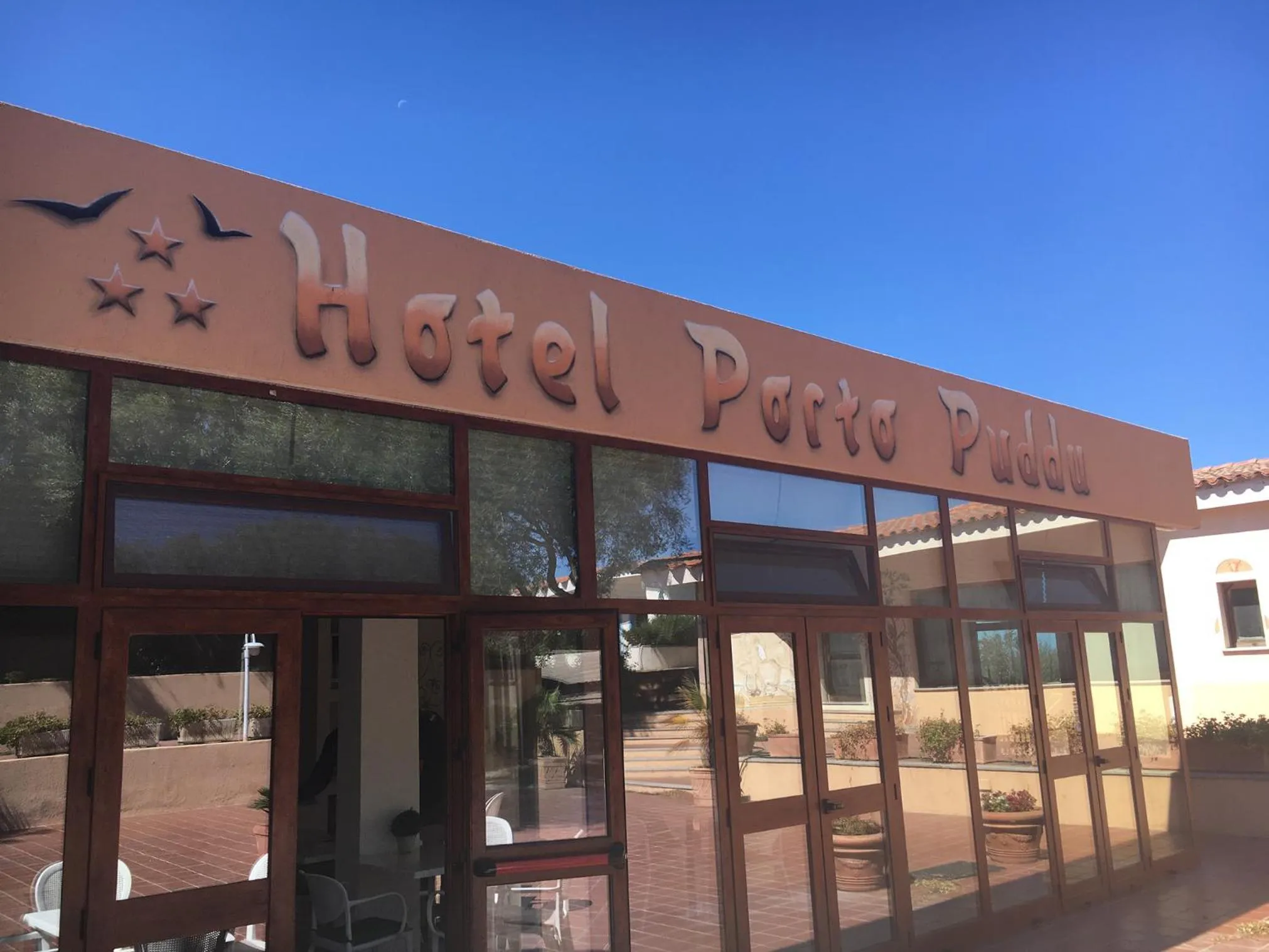 Property logo or sign in Hotel Porto Puddu - Il Nido dei Gabbiani