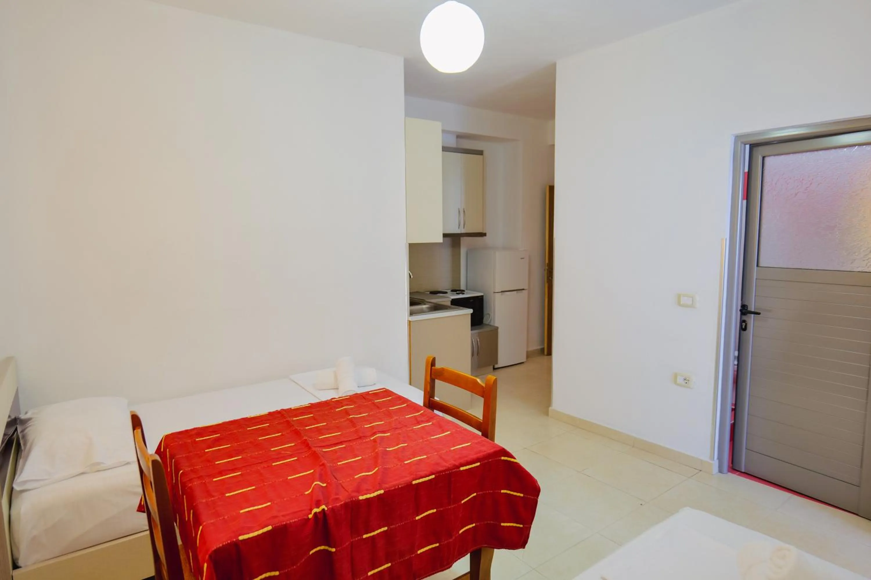 Bed in Hotel Argjiro