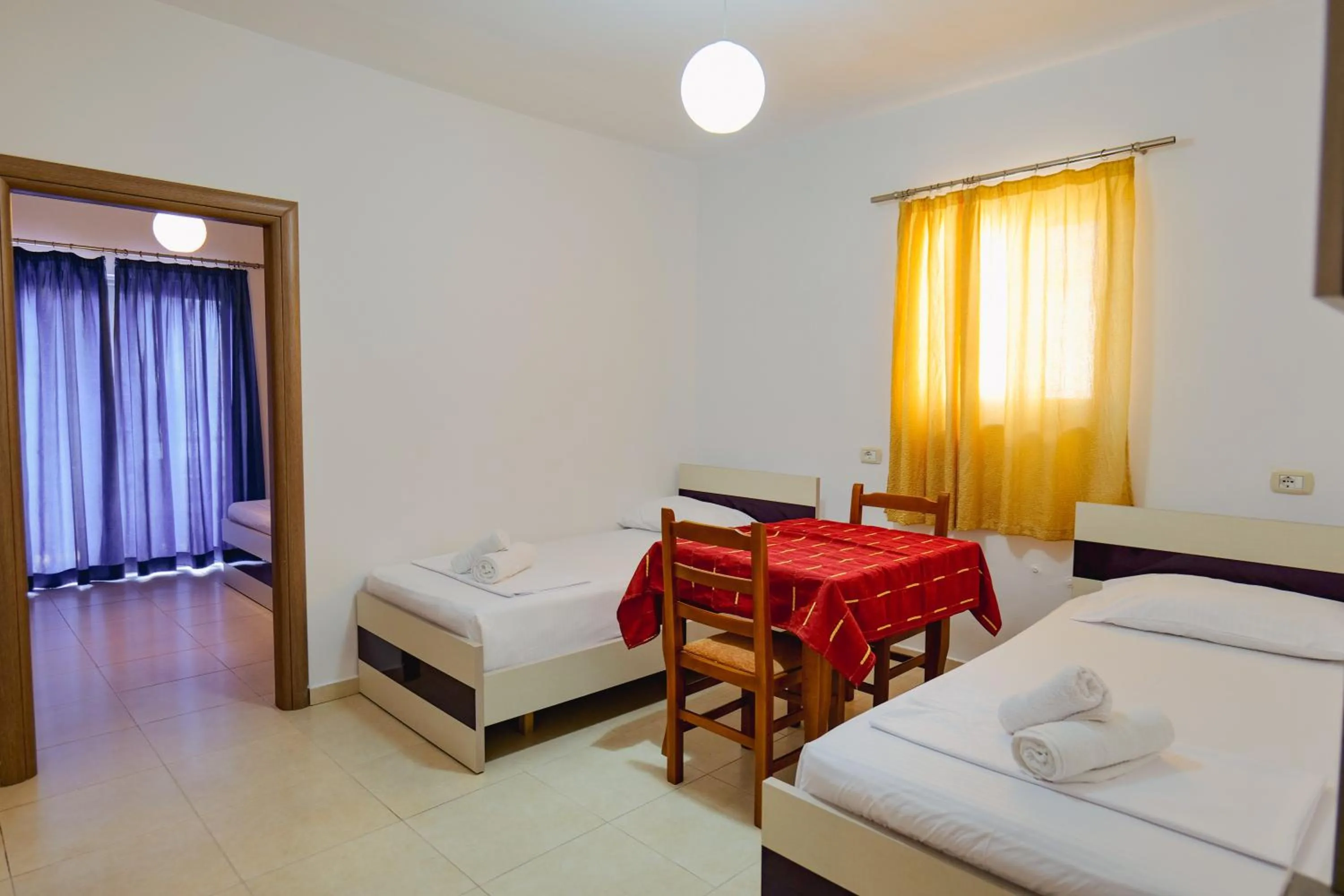 Bed in Hotel Argjiro