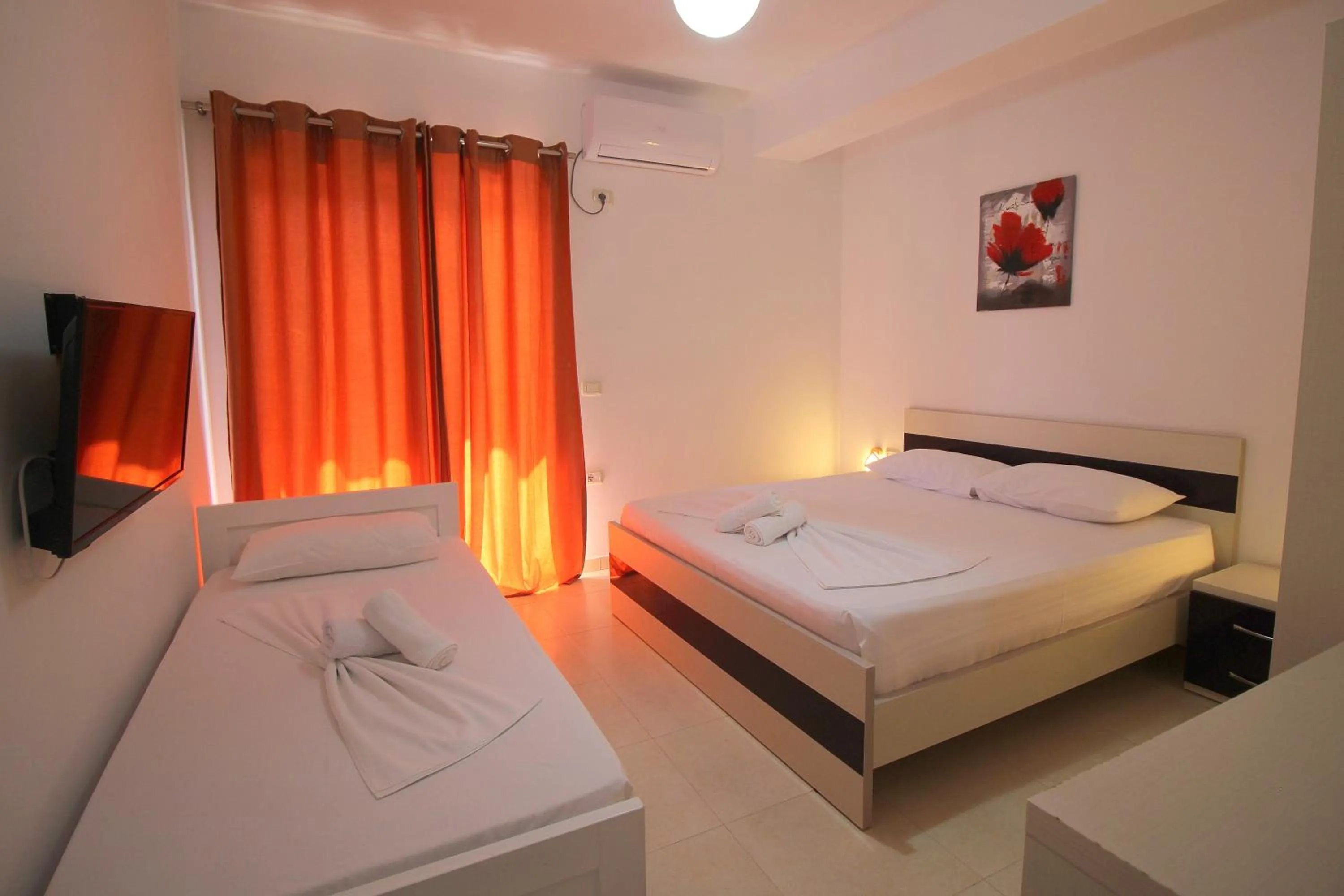 Bed in Hotel Argjiro