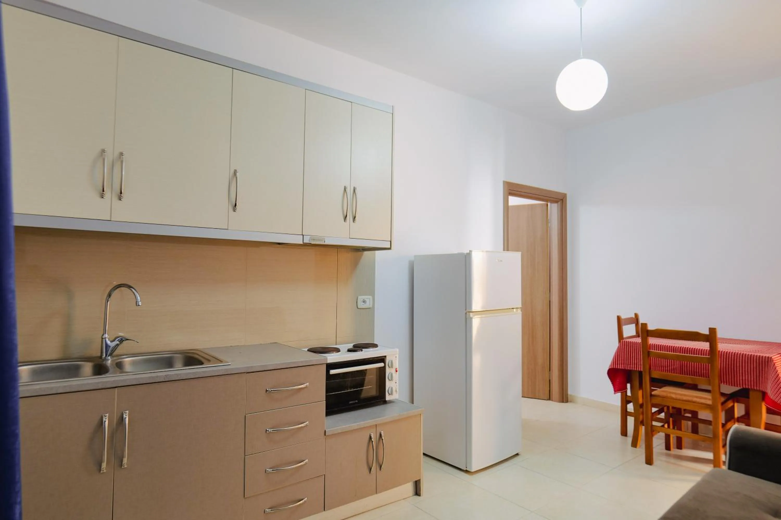 Kitchen or kitchenette in Hotel Argjiro
