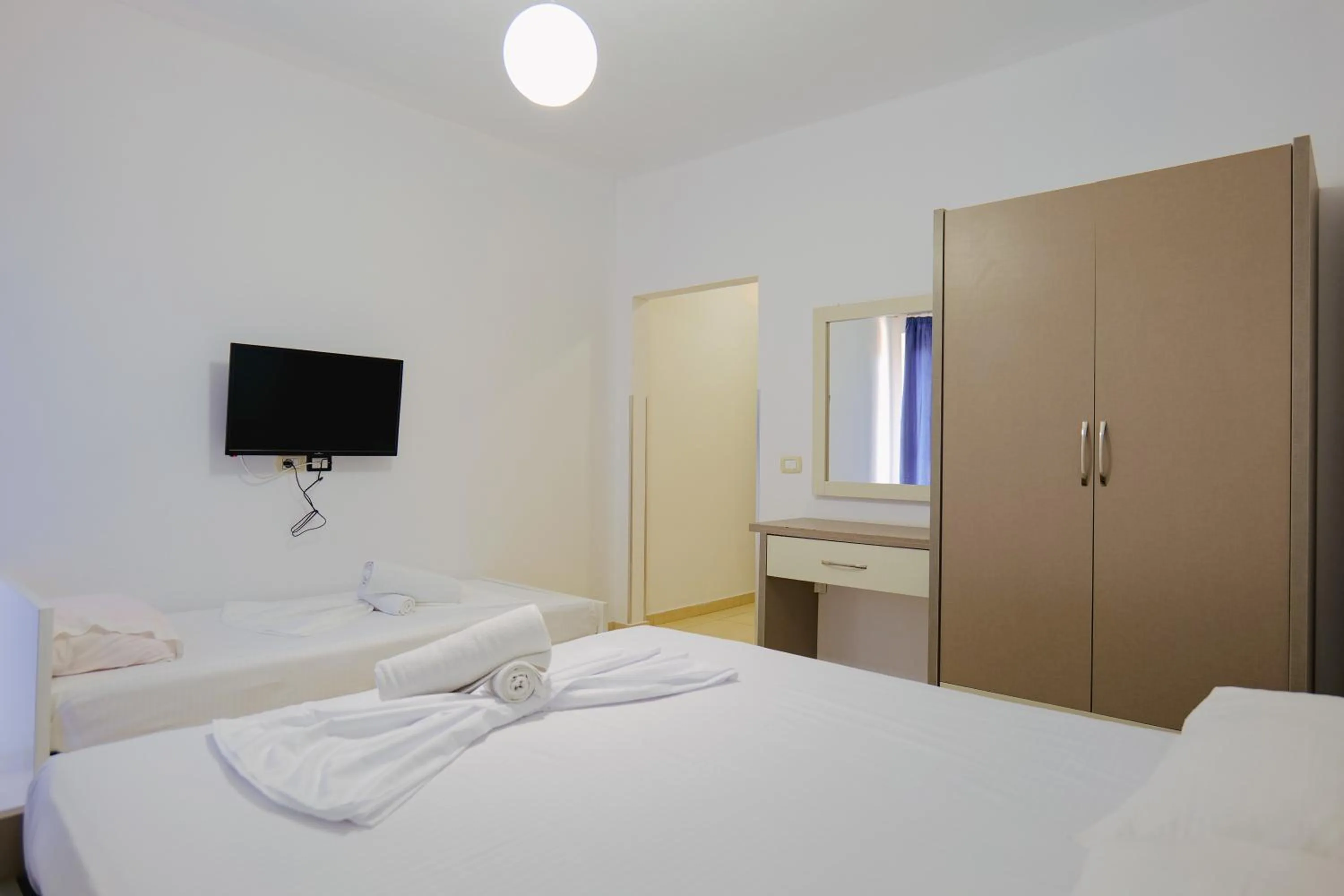 Bed in Hotel Argjiro