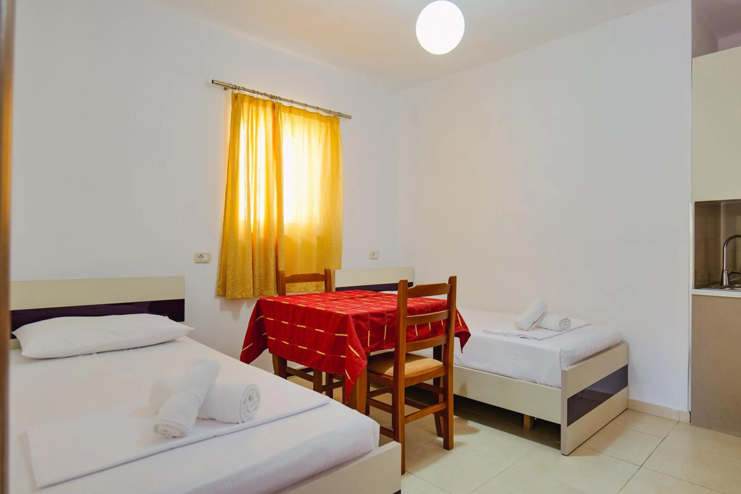 Bed in Hotel Argjiro