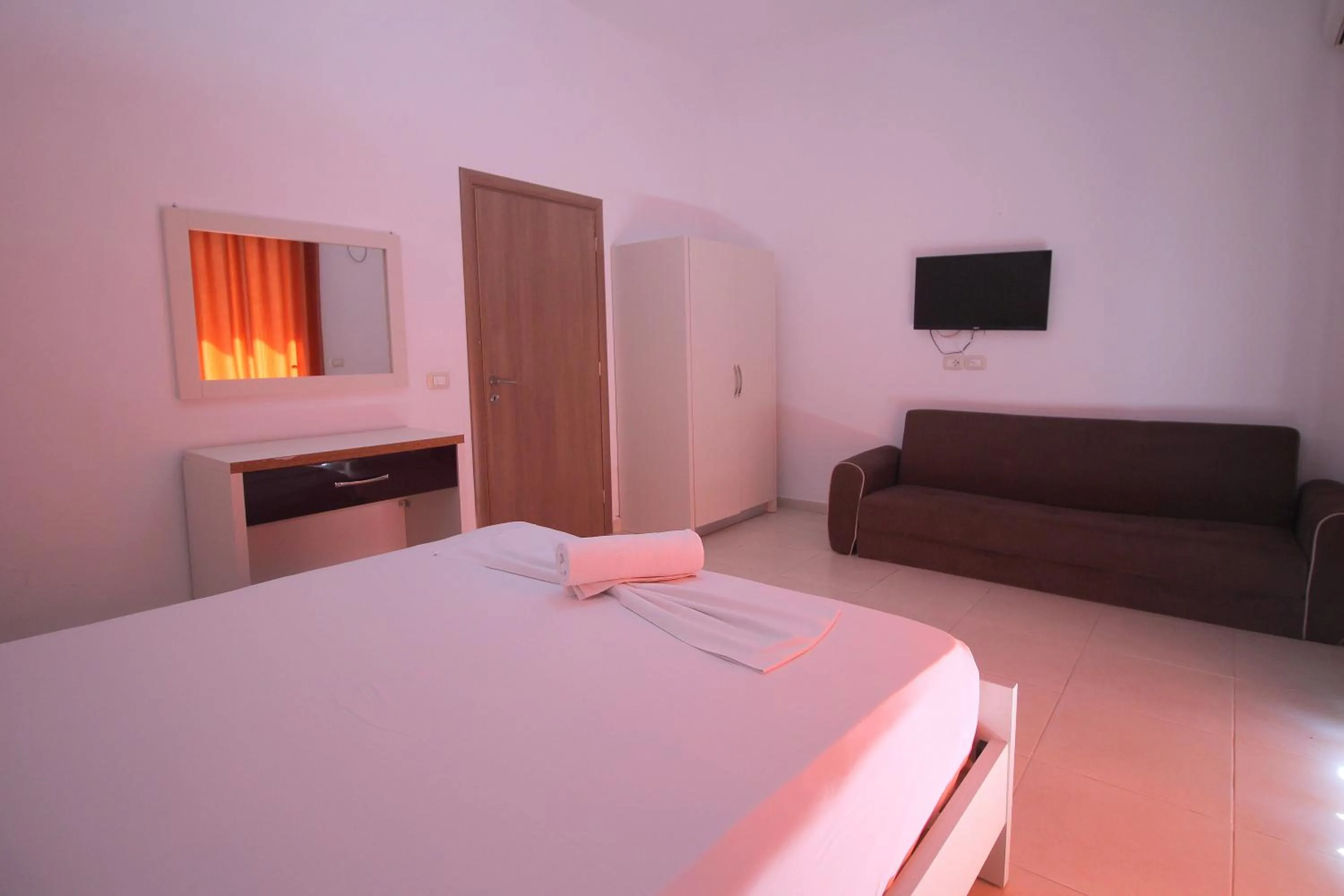 Bed in Hotel Argjiro