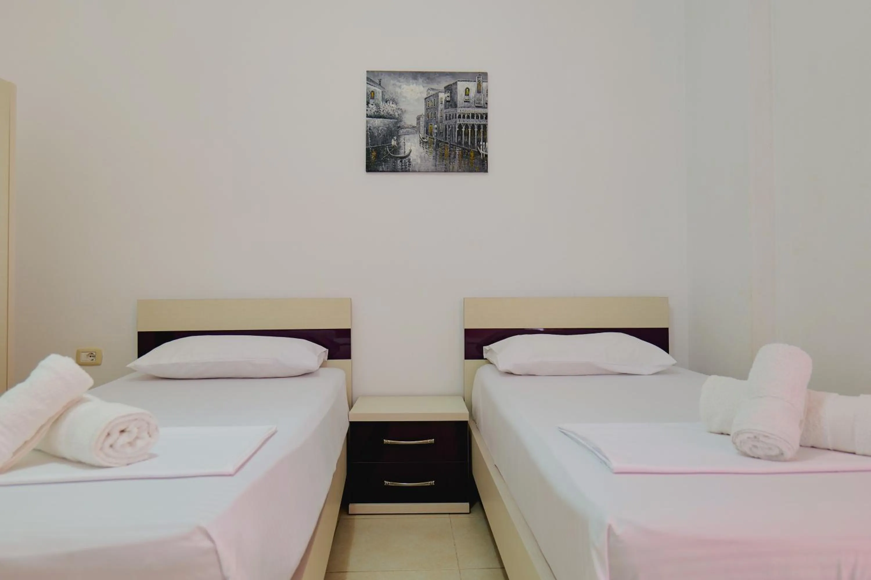 Bed in Hotel Argjiro